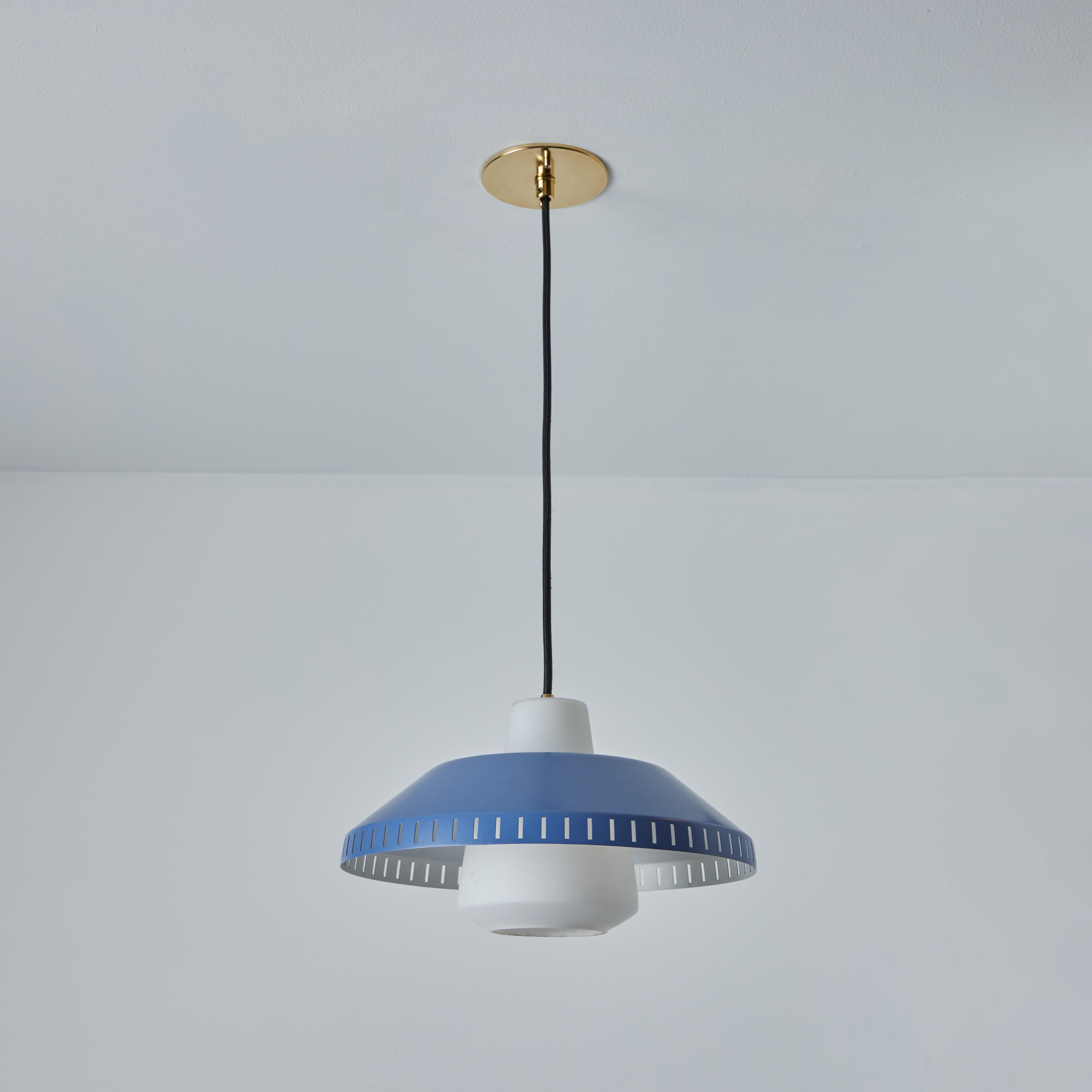 1960s Blue metal and opaline glass pendant attributed to Lisa Johansson-Pape. Executed in blown opaline glass and blue painted metal.

A contemporary of Paavo Tynell, the refined work of Lisa Johansson-Pape has made her an increasingly valued