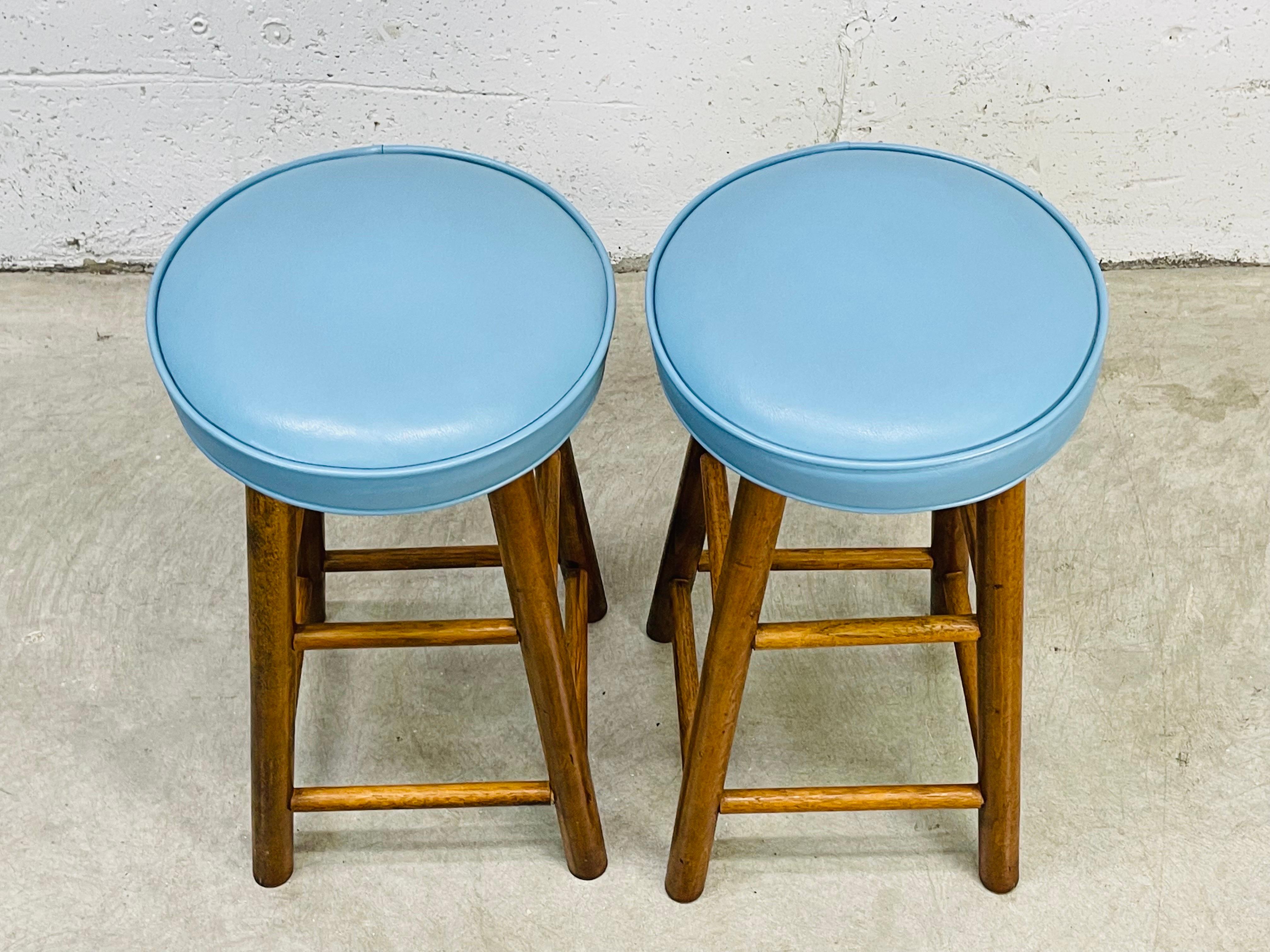 Mid-Century Modern 1960s Blue Vinyl Round Bar Stools, Pair For Sale