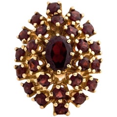 Retro 1960s Bohemian Garnet and 14 Karat Yellow Gold Cocktail Ring