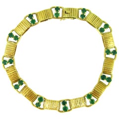 1960s Boucheron Paris Emeralds Yellow Gold Link Bracelet