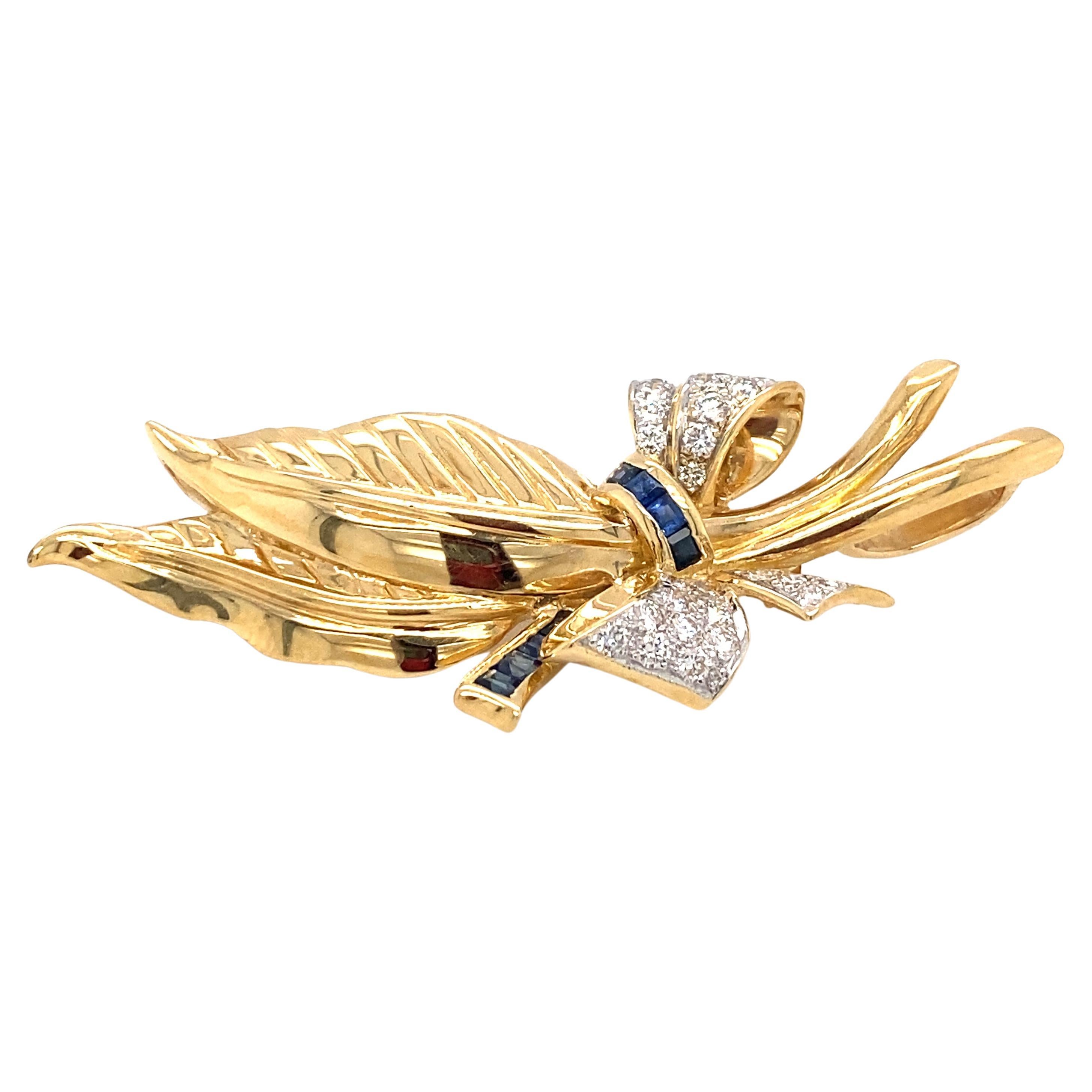 1960s Bow Leaf Pendant Brooch with Diamonds and Sapphires in 18 Karat Gold For Sale