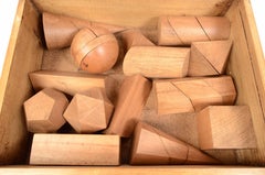 1960s Box Containing 14 Dismounplate Geometric Solids Of Oak Wood