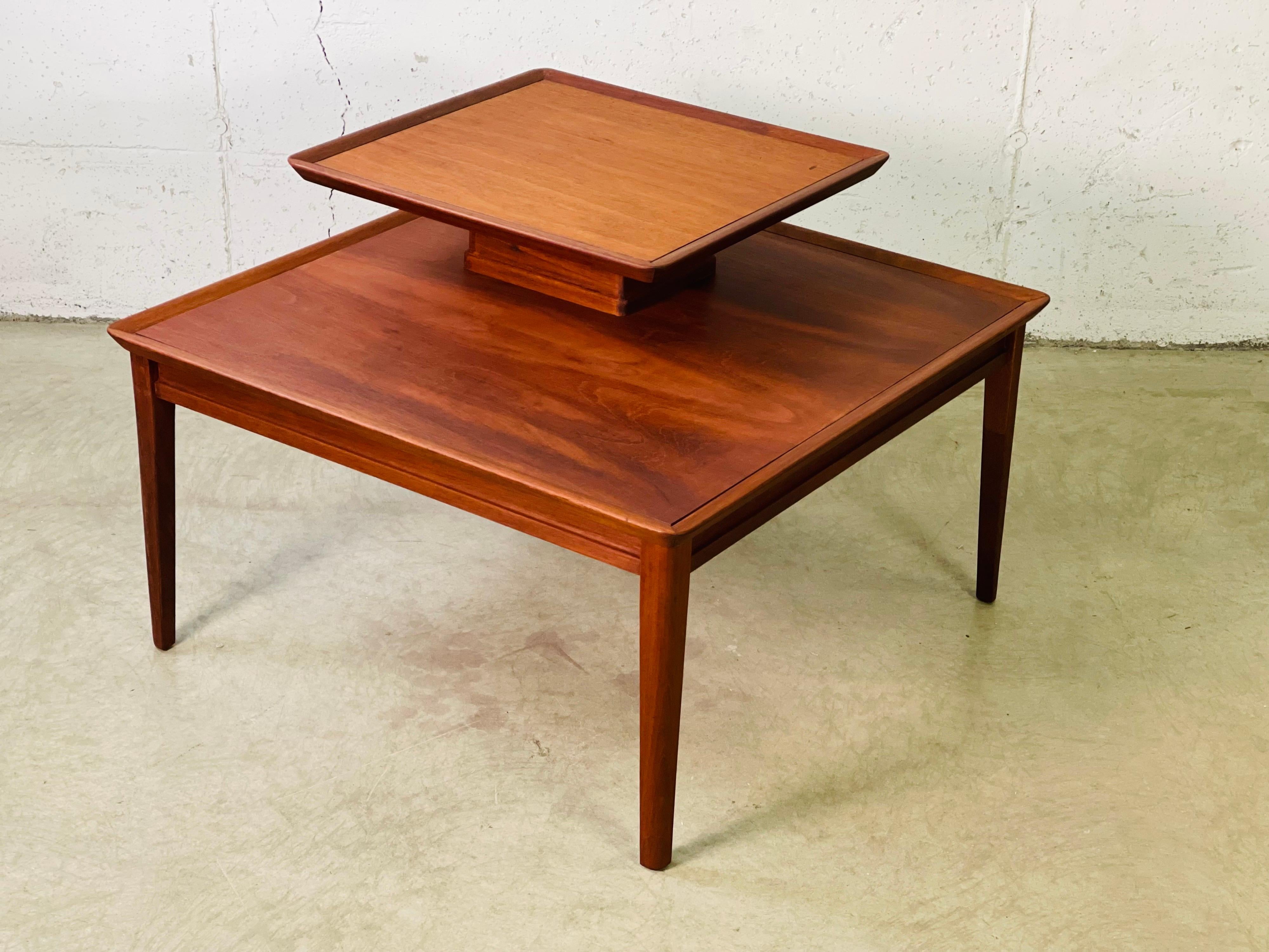 Vintage 1960s Brandt Furniture mahogany two-tier square side table. The first level is 17”H. The mahogany is solid with beautiful grain. Marked underneath.