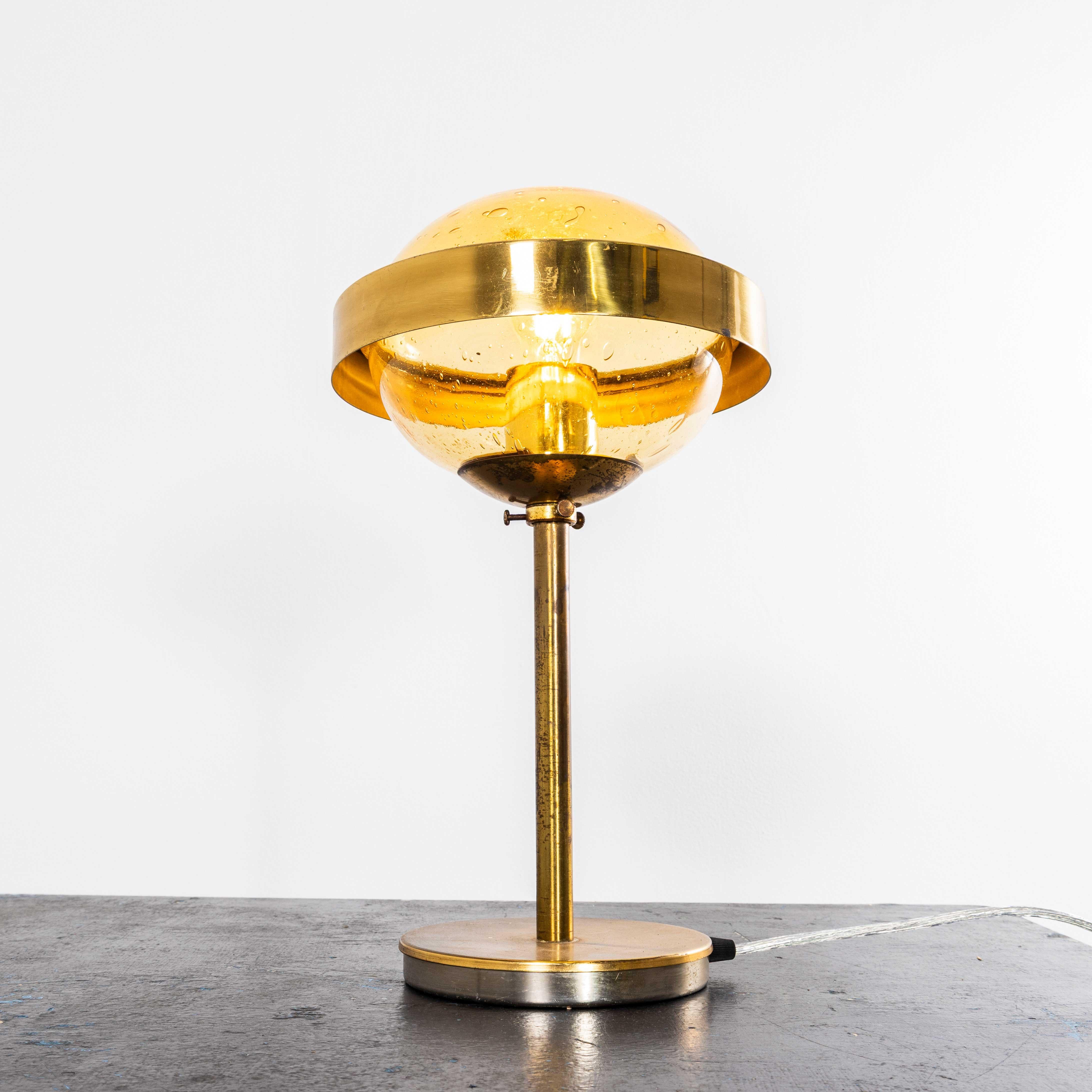1960’s Brass And Amber Glass Table Lamp. 
Stunning mid century glass lamp mouth blown in amber glass by the iconic Lustry Kamenicky Senon glassworks. The Czech republic has a rich international history of glass production championed by the iconic
