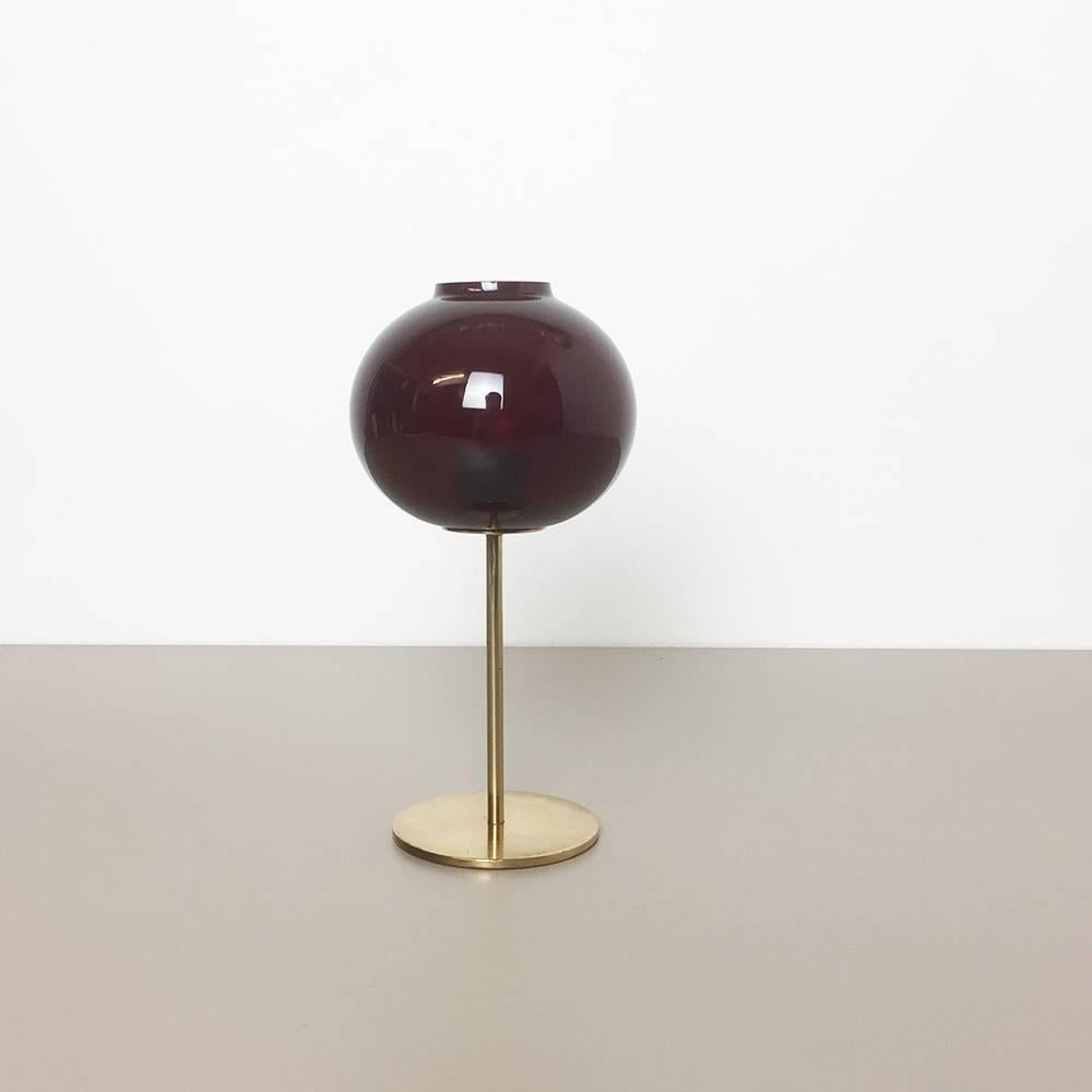 Article:

Candleholder element with super rare dark red shade

Design:

Hans-Agne Jakobsson

Producer:

Hans-Agne Jakobsson ab, Sweden

This candlelight holder was designed by Hans Agne Jakobsson in the 1950s and produced by his own