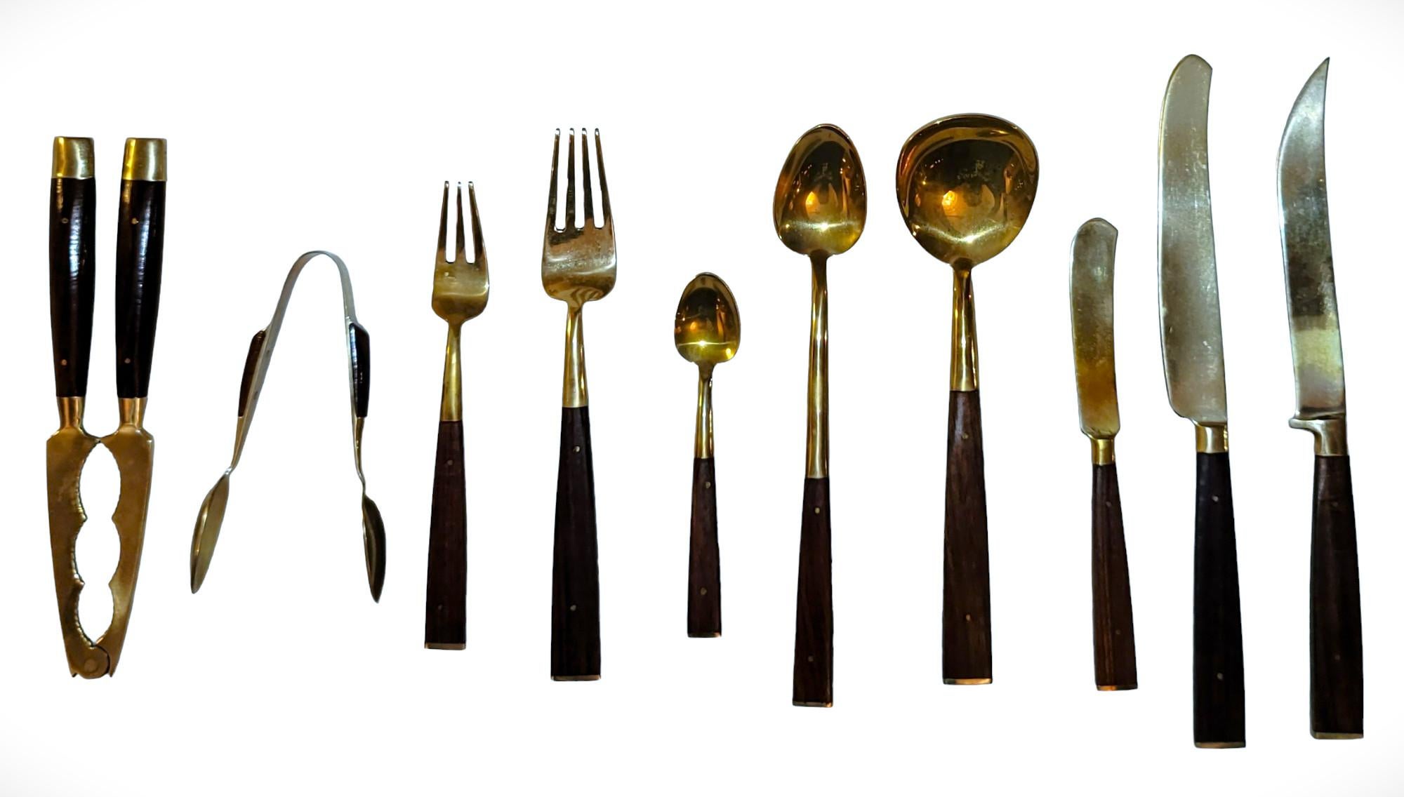 1960s 146 pcs flatware set in great condition. This flatware set has everything you need to serve 12 people in style. This 12-person set comes with the original box and all compartments ready to use!