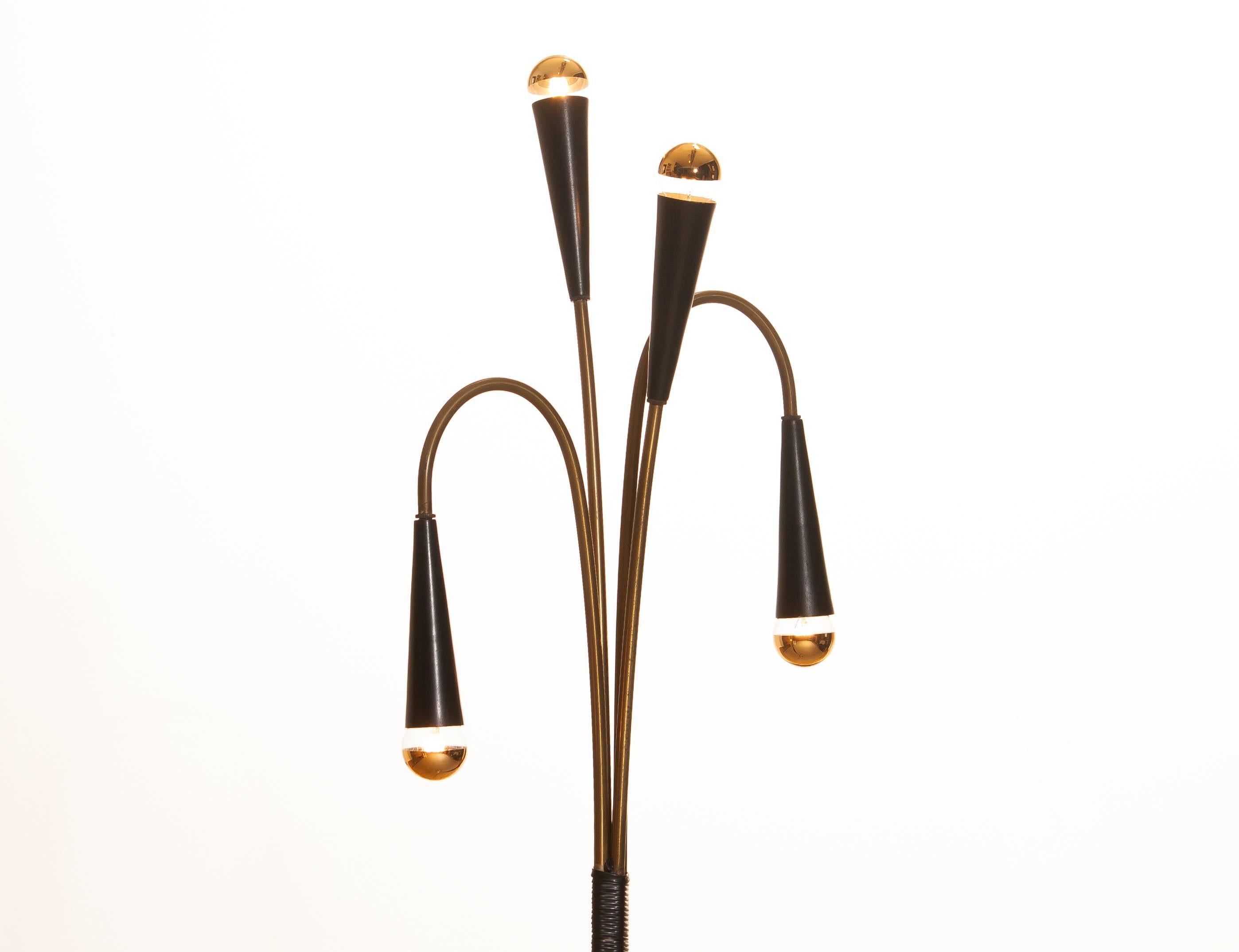 Beautiful and rare floor lamp made by Lumi.
Designed by Oscar Torlasco.
This lamp is made of brass with black lacquered metal details.
It is in an original condition and technical 100%.
Period 1960s.
Dimensions: H 140 cm, W 39 cm.