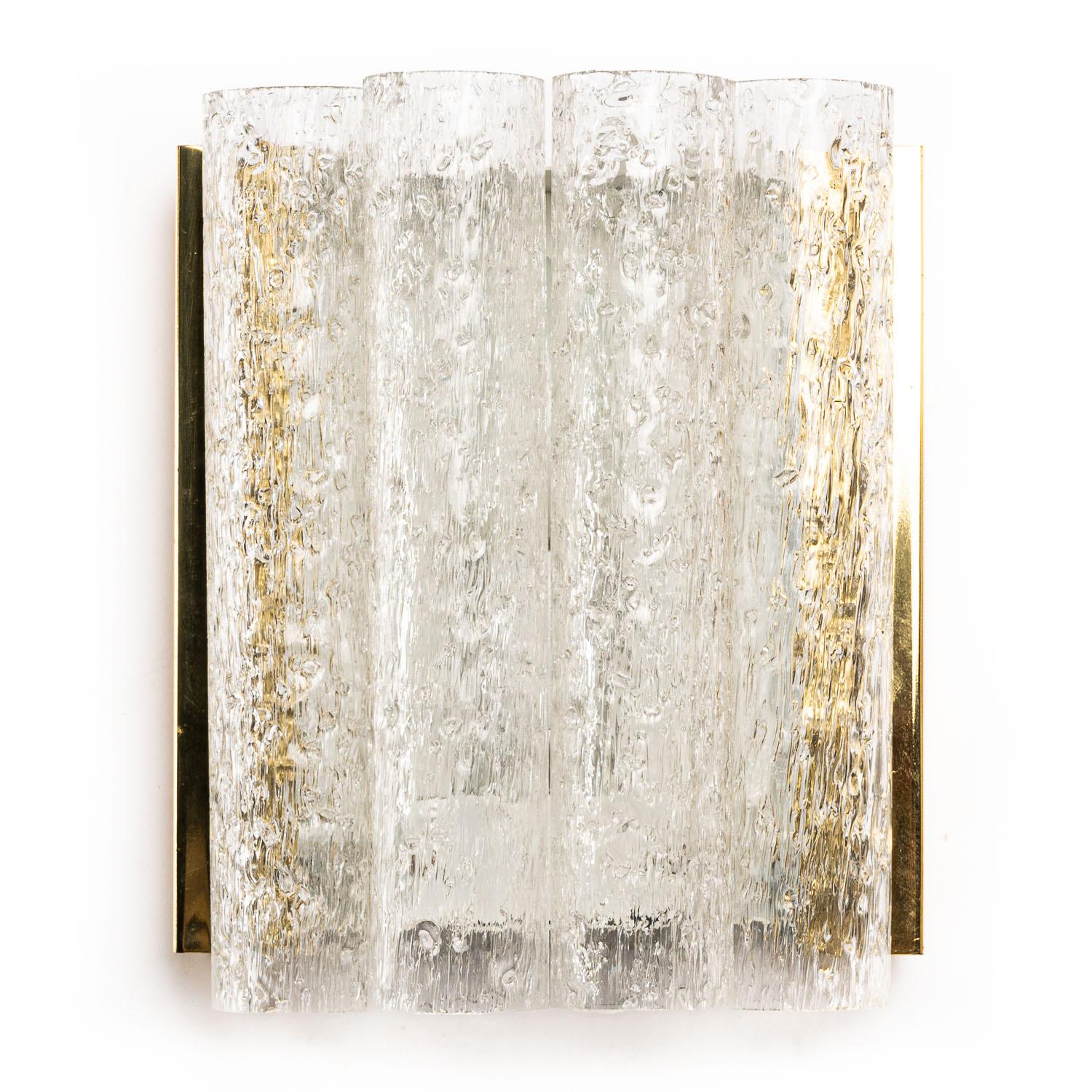 If you like vintage lighting then you will love this Doria glass sconces. Designed with four vertical tubes within brass frame work sides and metal centre, it's a highly distinctive piece and looks stunning when illuminated. Authenticity is