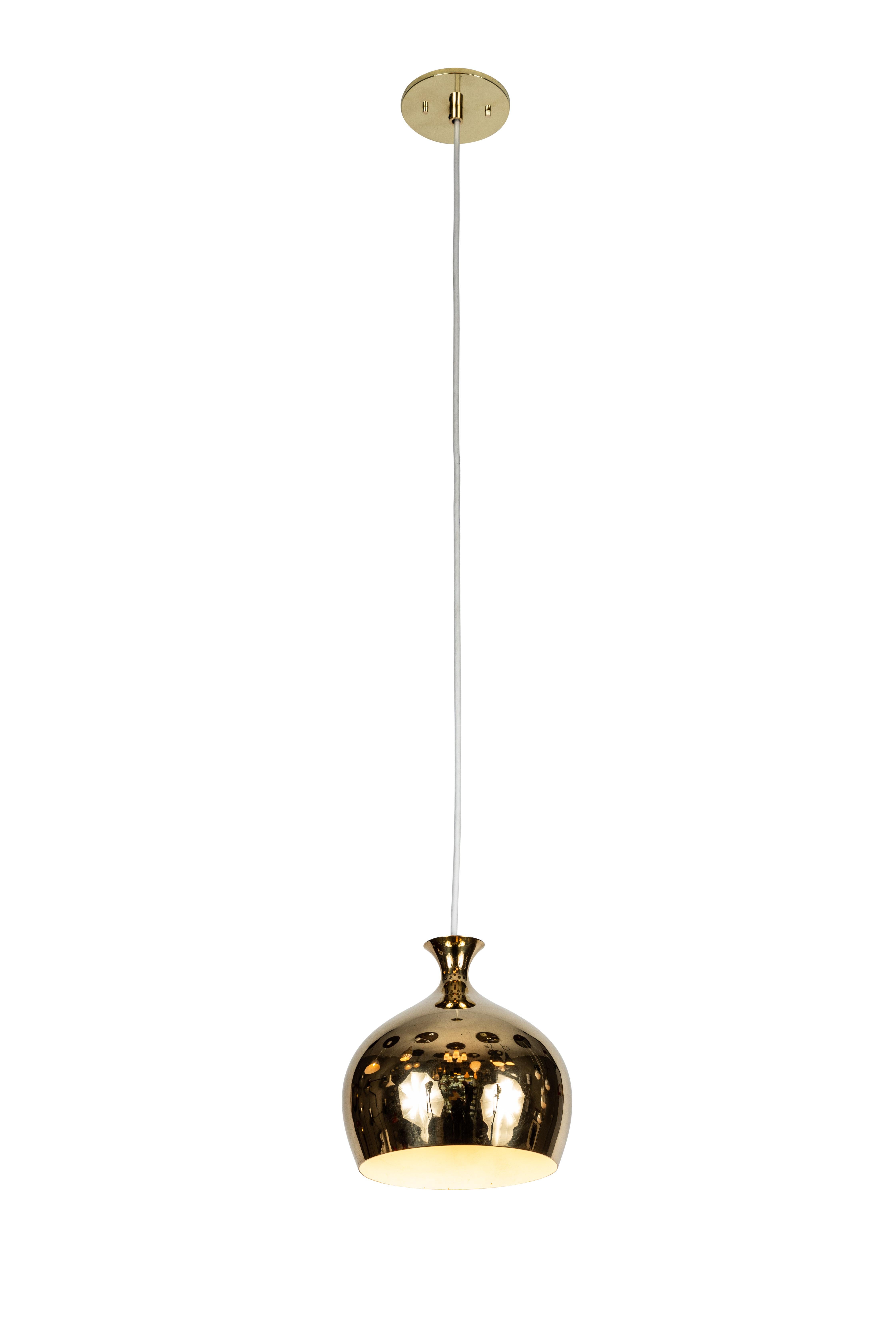 1960s brass 'Onion' pendants by Helge Zimdal for Falkenberg, Sweden, circa 1960s. A rare and beautiful pair of sculptural pendant lamps executed in perforated brass and metal. 

Price is for the pair. Also available in a perforated brass pair in a