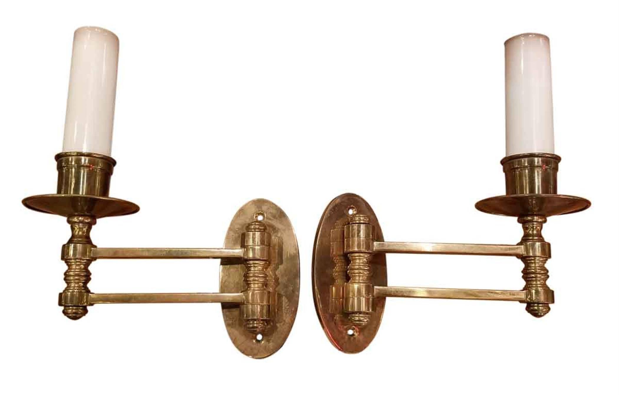 1960s quality brass swing arm piano sconces. Priced per pair. At time of posting two sets available. These can be seen at our 2420 Broadway location in Manhattan.