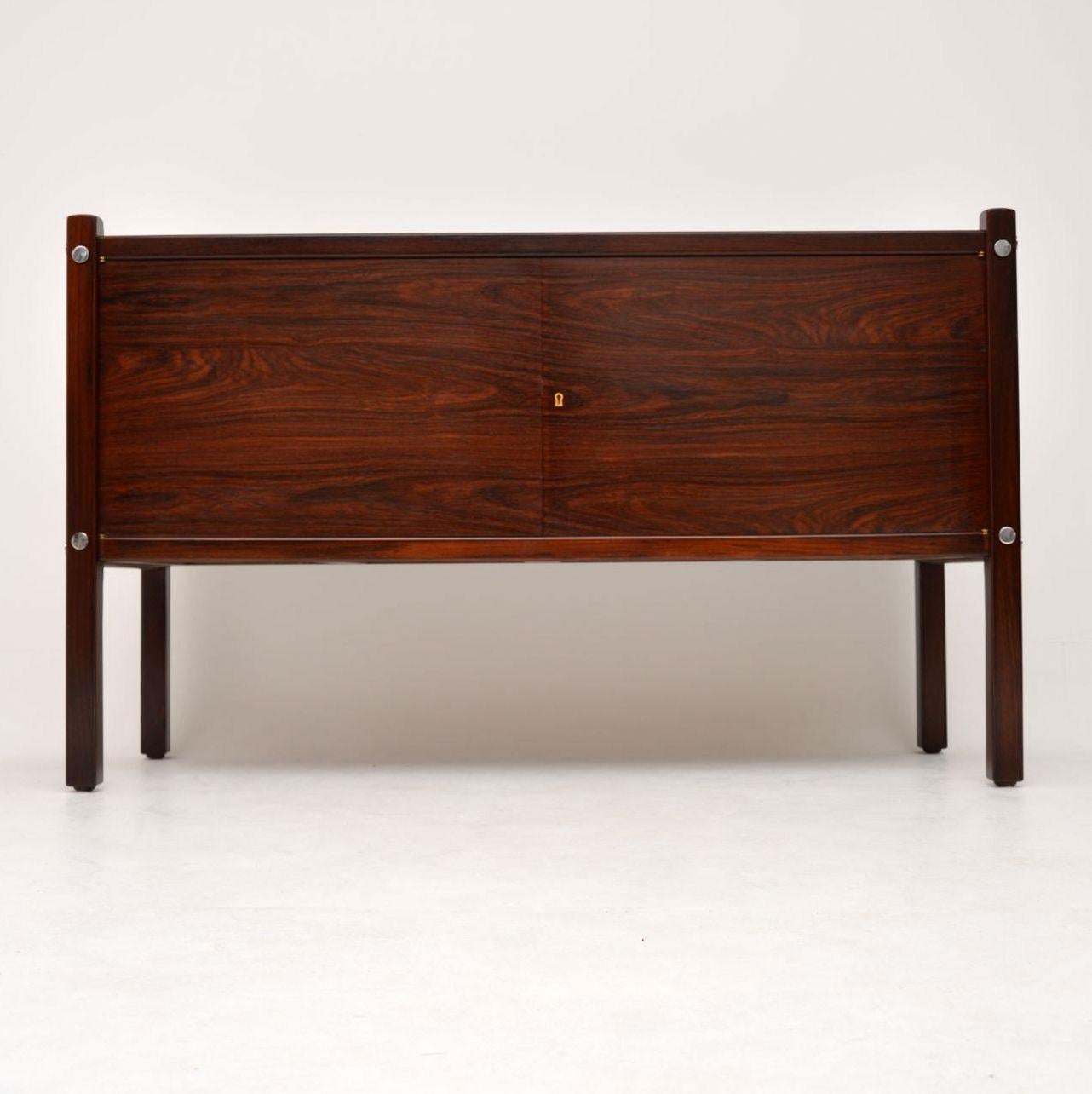 A stunning and extremely rare vintage sideboard by the important Brazilian designer Sergio Rodrigues. This model is called the Luciana sideboard, it was made in Brazil during the 1960s by OCA. We have had this stripped and re-polished to a very high