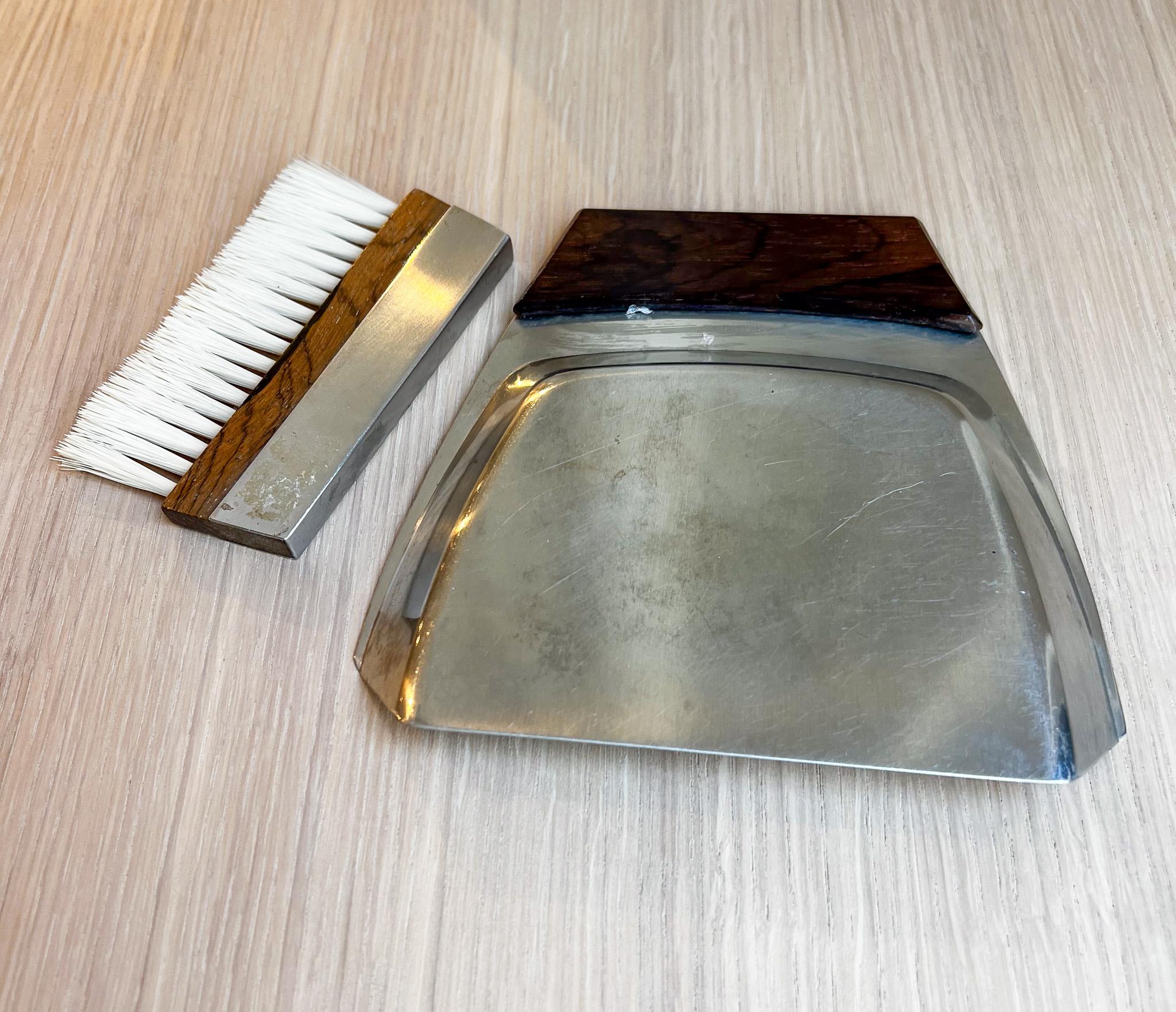 Available today, this Brazilian mid-century modern cleaning set by Hercules Inox is absolutely stunning! Made in the 1960’s, this cleaning set comes with a miniature shovel and brush and is perfect for cleaning. The shovel is made with an iron blade