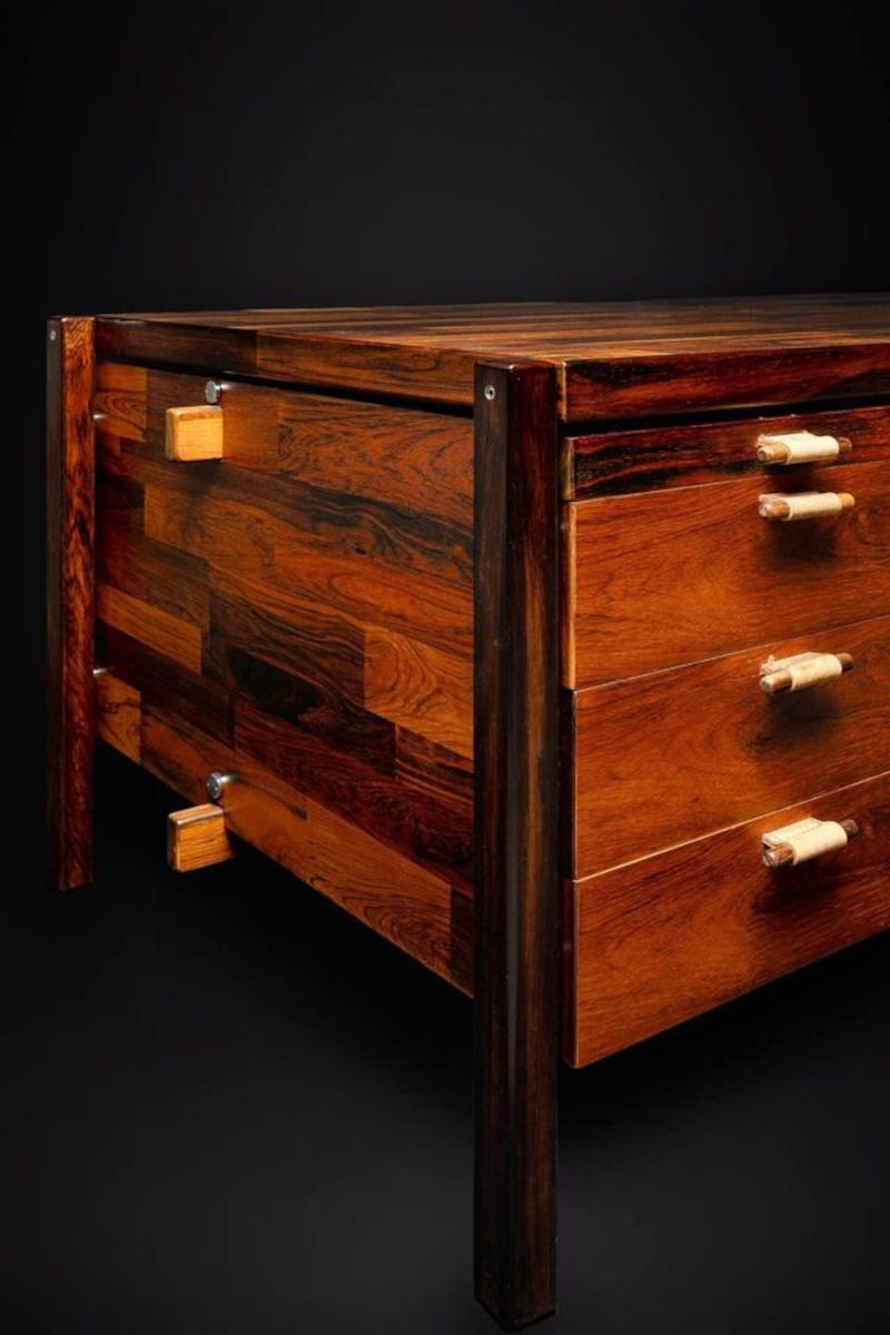 Fresh from restoration, we are thrilled to present the newest edition to our esteemed Brazilian furniture collection. Designed by Jorge Zalszupin for L'atelier in the 1960's, this early example features two banks of drawers, original leather and