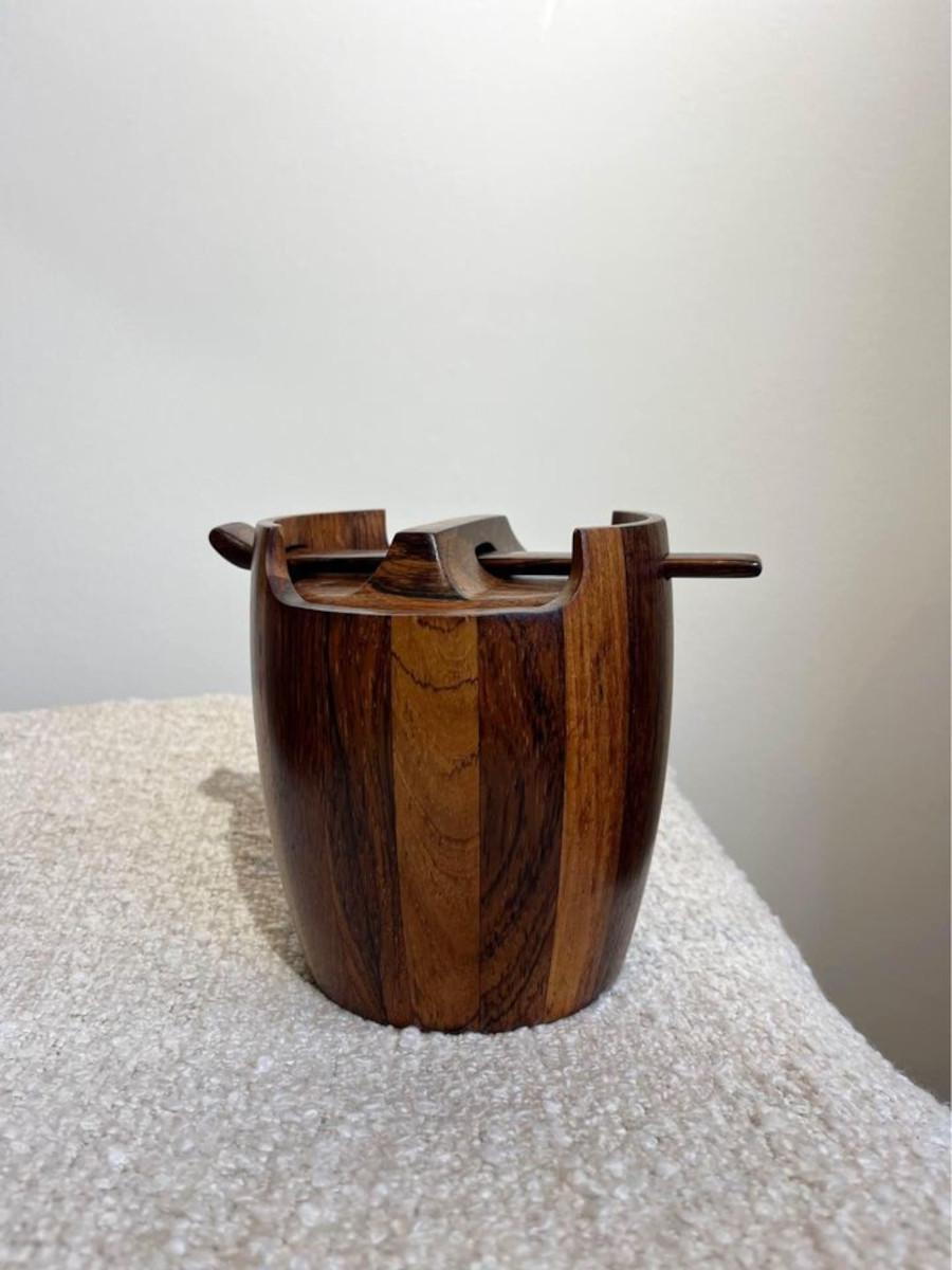 We're thrilled to introduce the latest addition to our revered vintage Brazilian smalls collection: an iconic piece from the legendary designer Jean Gillon's Wood Art collection. Behold this exquisite tobacco jar, meticulously crafted from the