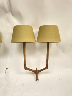 1960's bronze sconces in the style of Diego Giacometti
