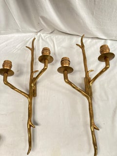 1960's bronze sconces in the style of Felix Agostini