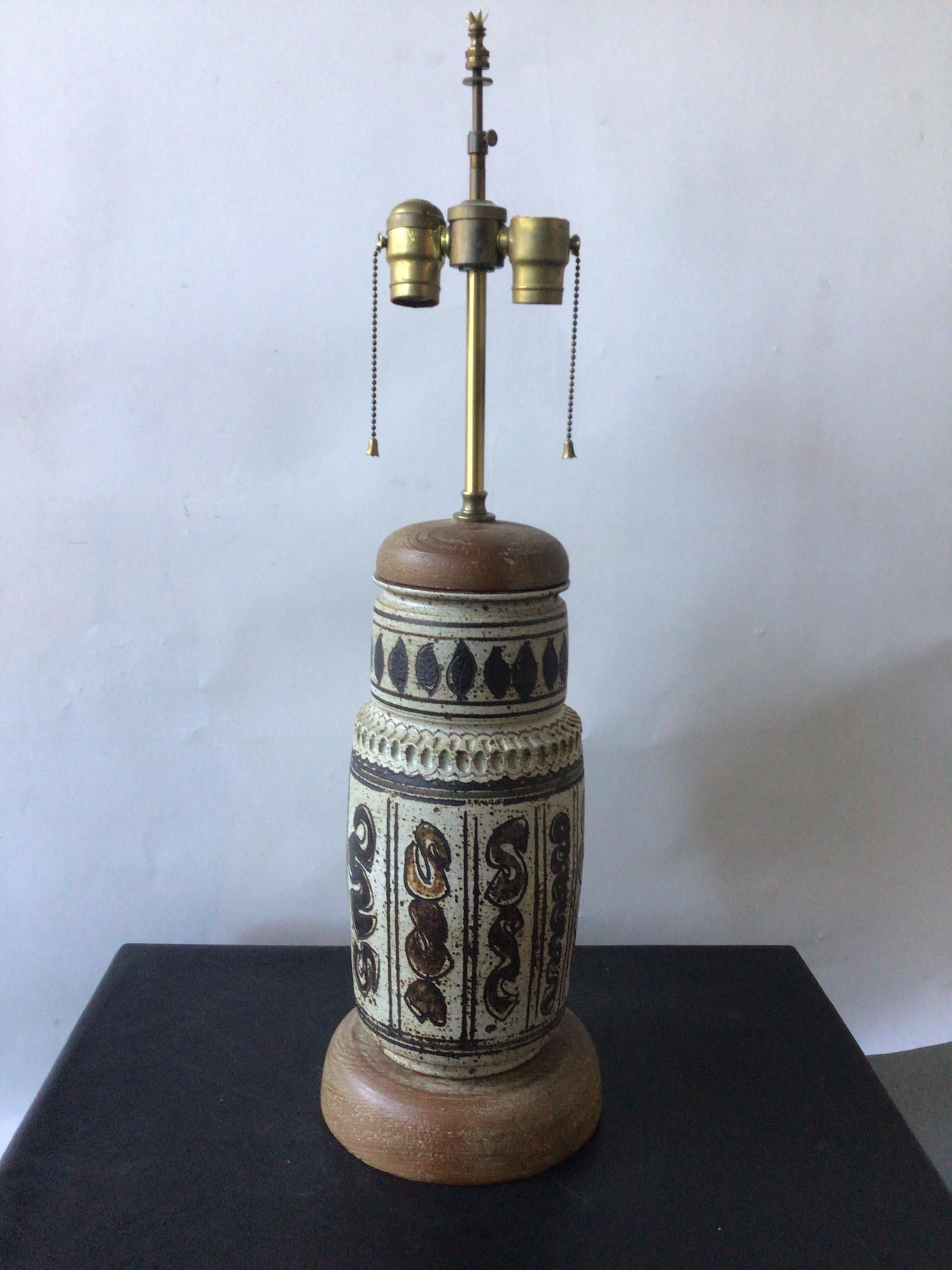 1960s Ceramic lamp with cerused wood top and base.