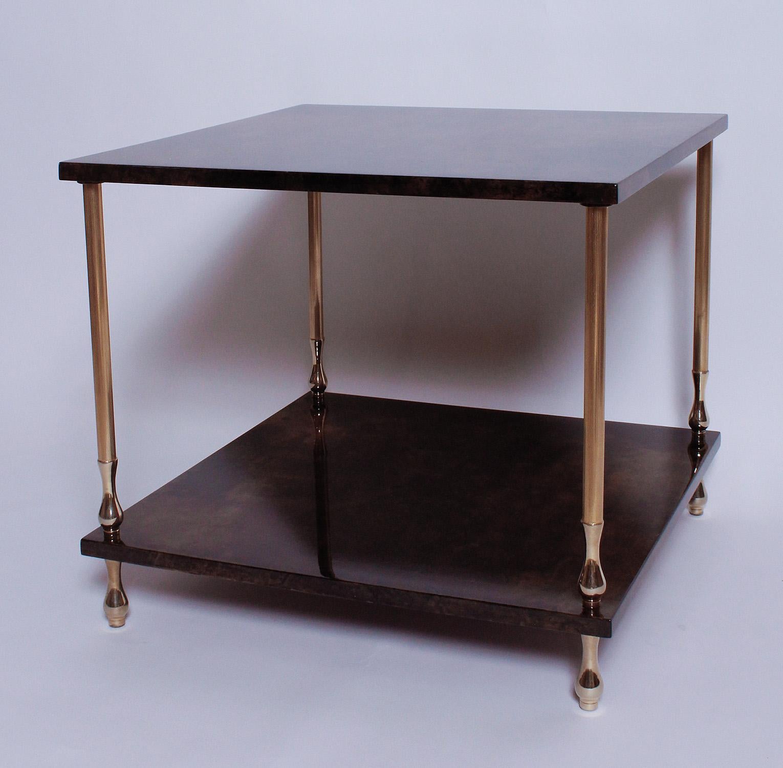 Our 1960s two-tiered brown goatskin and brass table by Aldo Tura can serve as either a coffee table or large side table.