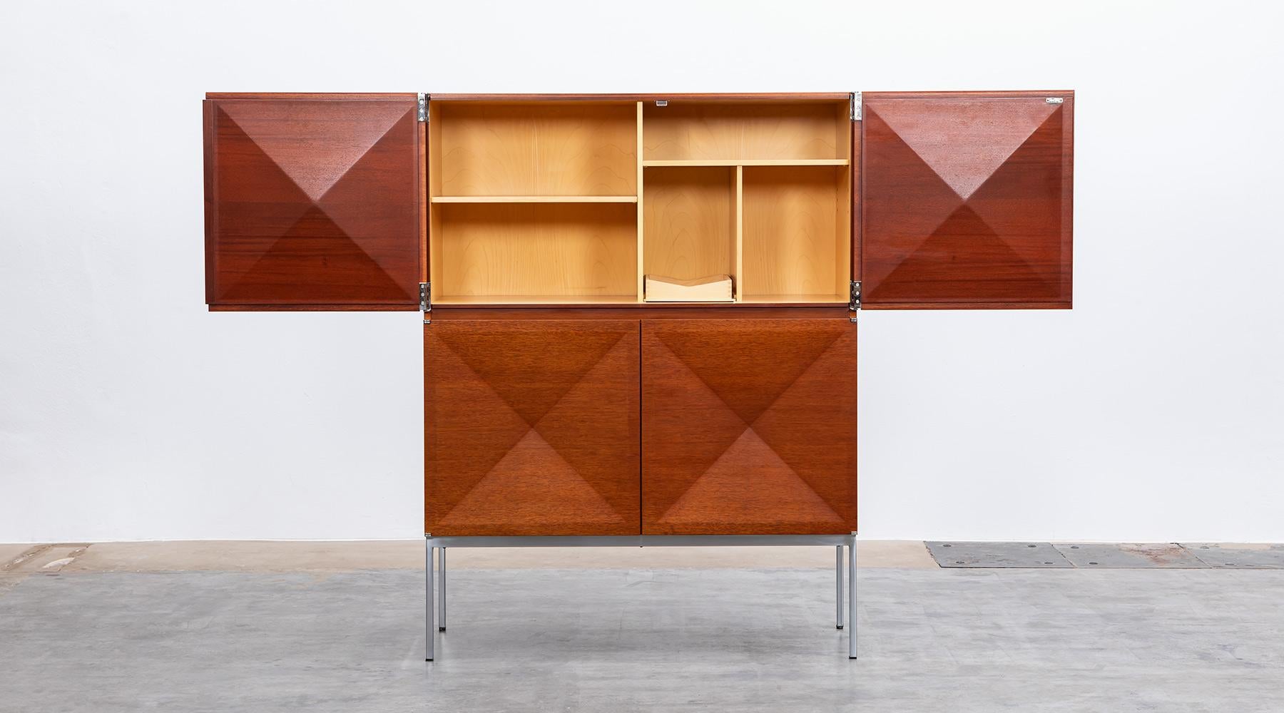 Philippon / Lecoq, Highboard, mahogany, maple, Manufactured by Behr, Germany, 1964.

Highboard with diamond shaped doors designed by Antoine Philippon and Jacqueline Lecoq. Corpus is mahogany and the inlay in maple features a big storage area with
