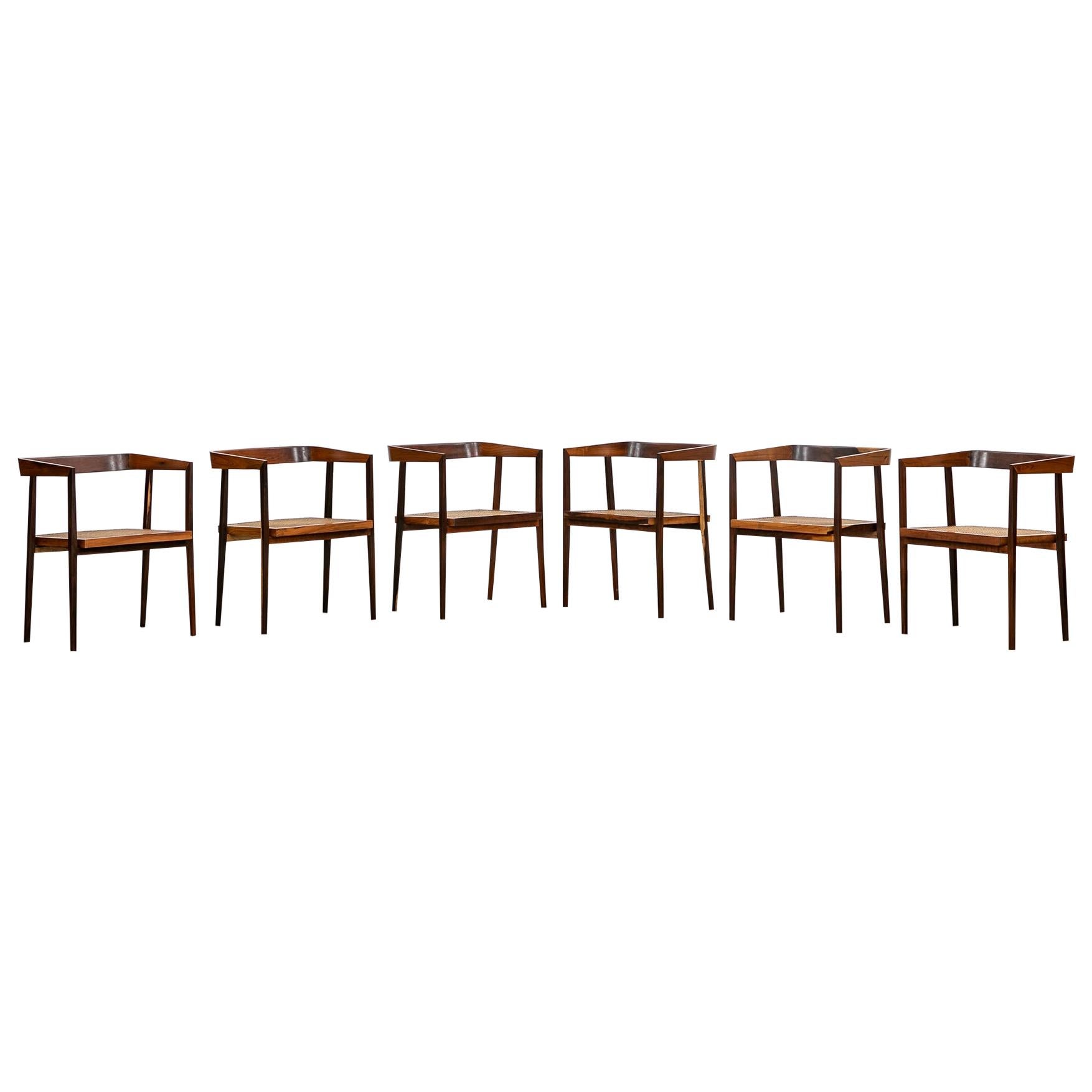 1960s brown wood and cane Chairs by Joaquim Tenreiro