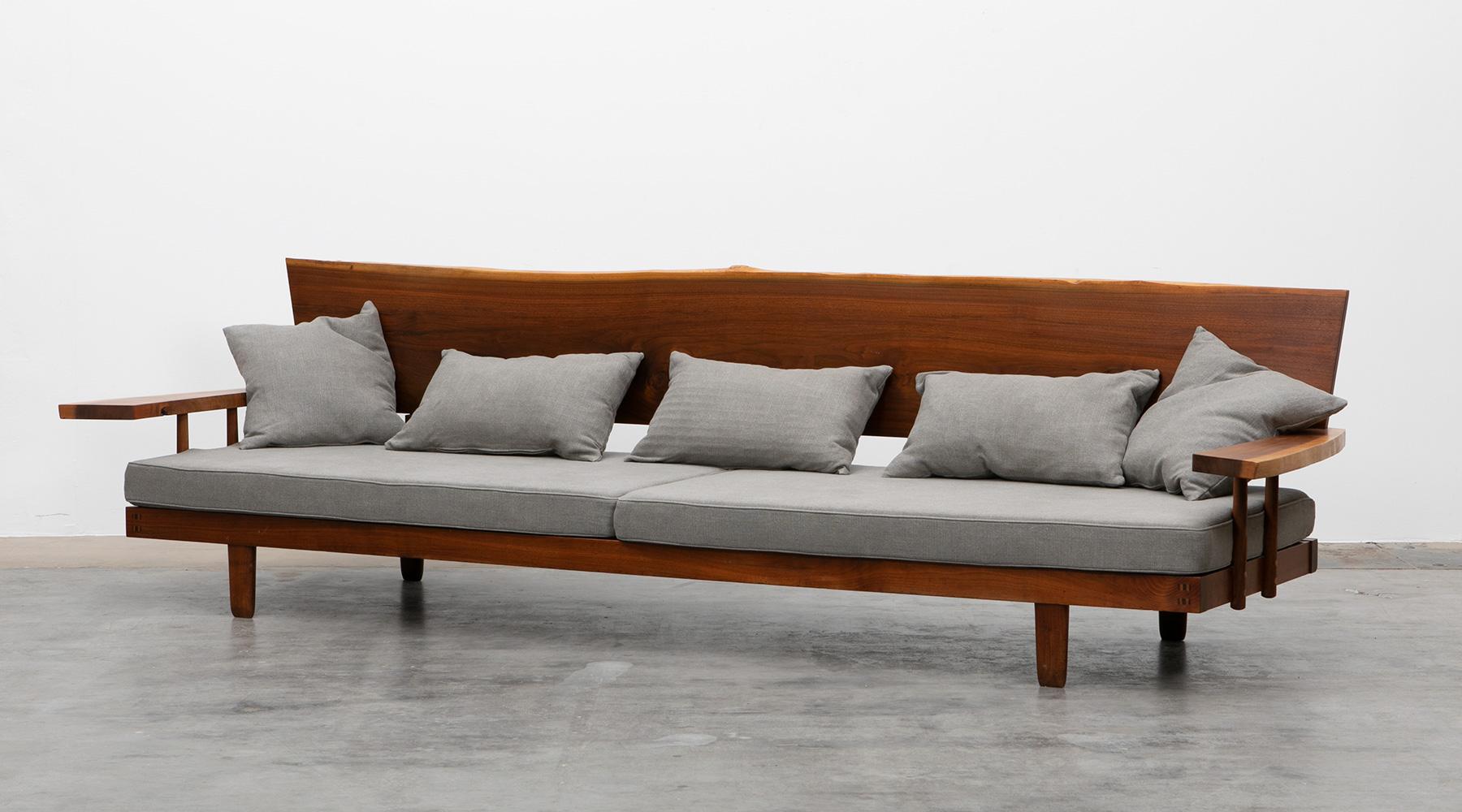 Sofa by George Nakashima, American walnut, new upholstery, USA, 1960.

Handcrafted, stunning, marvellous sofa. It is constructed with American walnut with handwork by George Nakashima himself. 

By that, it’s being a great example of Nakashima's