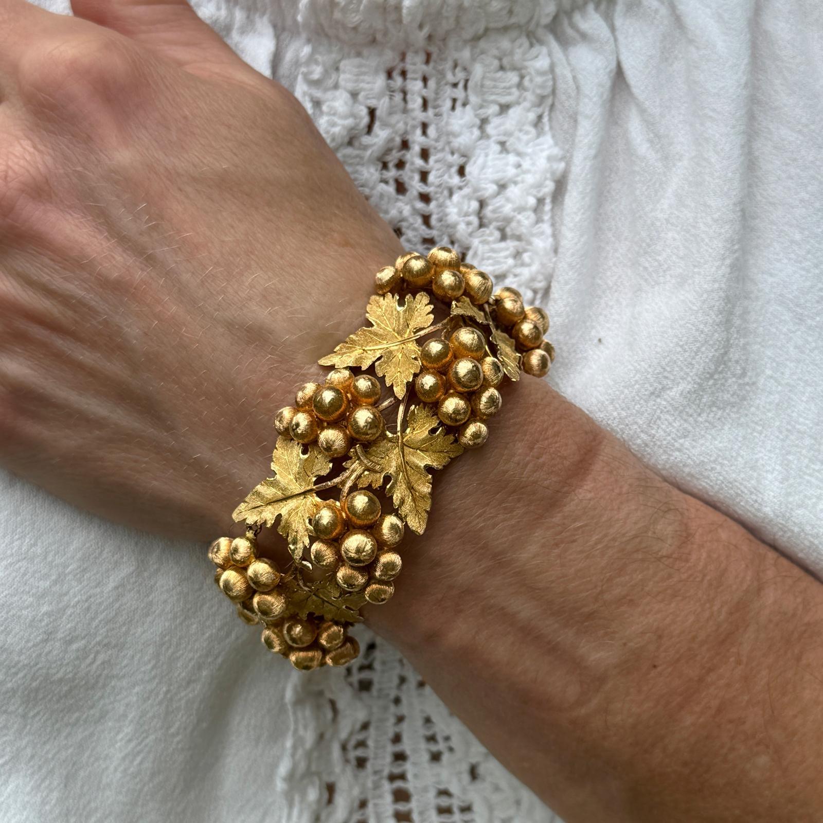 The Buccellati vintage grape leaf bracelet is a statement piece that effortlessly combines natural inspiration with exquisite craftsmanship. Hand crafted in 18 karat yellow gold, this bracelet is a timeless piece that exudes elegance and
