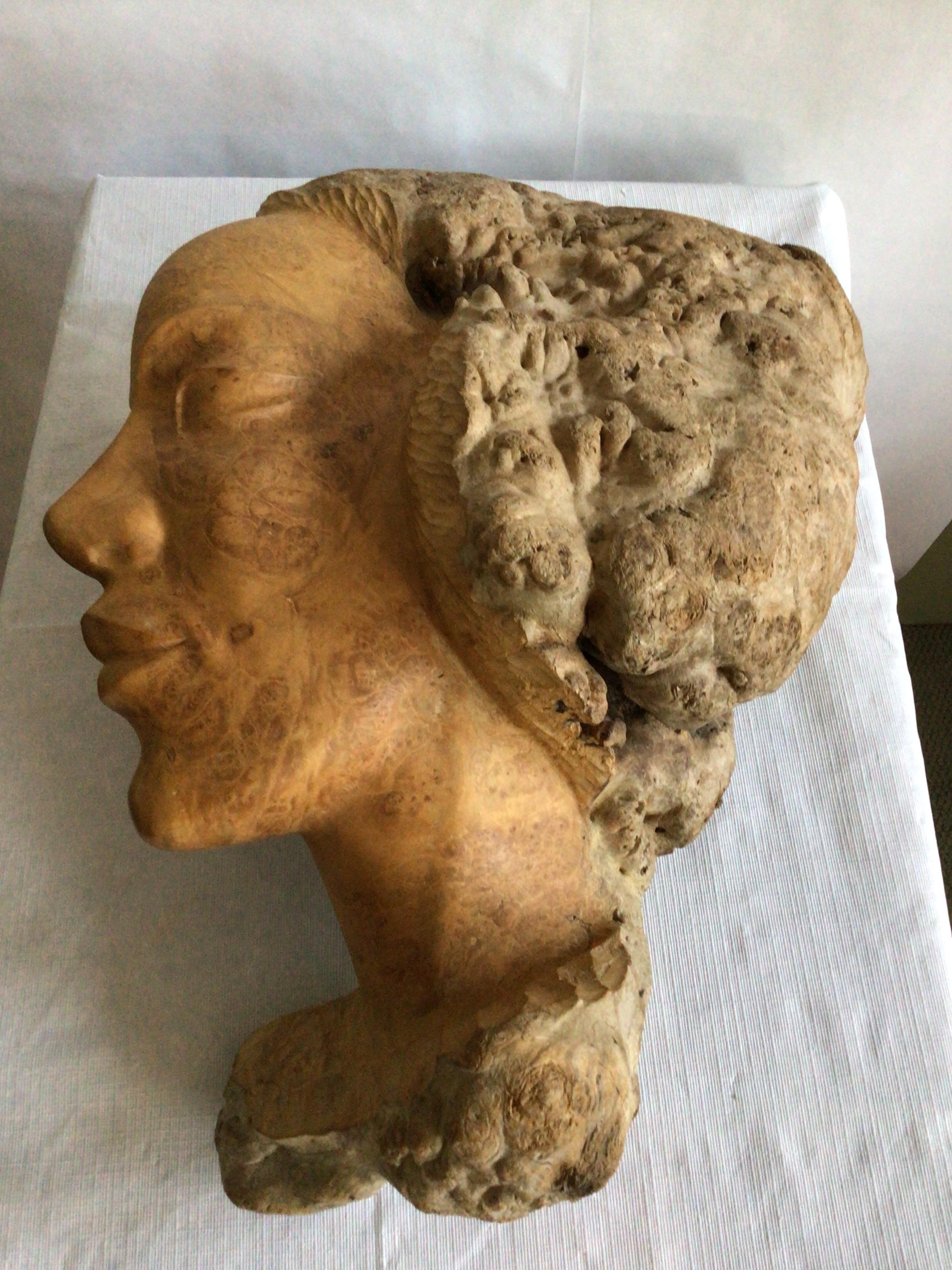 1960s Burl Wood Carving of A Woman's Face
Warm natural burl wood tones add texture and interest to this hand-carved sculpture
Natural and yet refined 
Small chip in burl as shown in picture