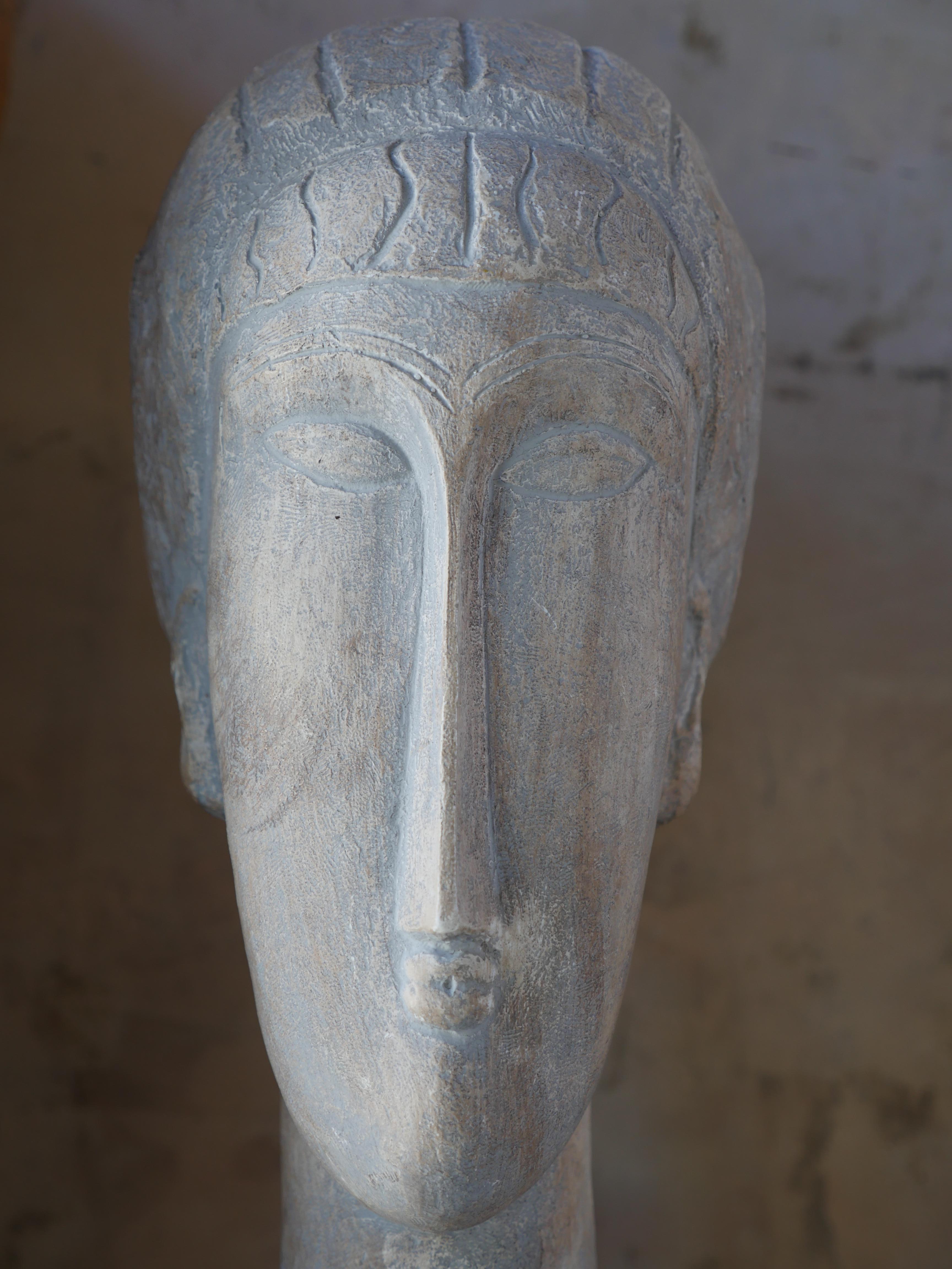 This 1960s Austin Productions vintage ceramic bust draws inspiration from the iconic works of Amedeo Modigliani. The sleek and elongated neck and nose capture the essence of the renowned artist's style. This bust would make a a great addition to any