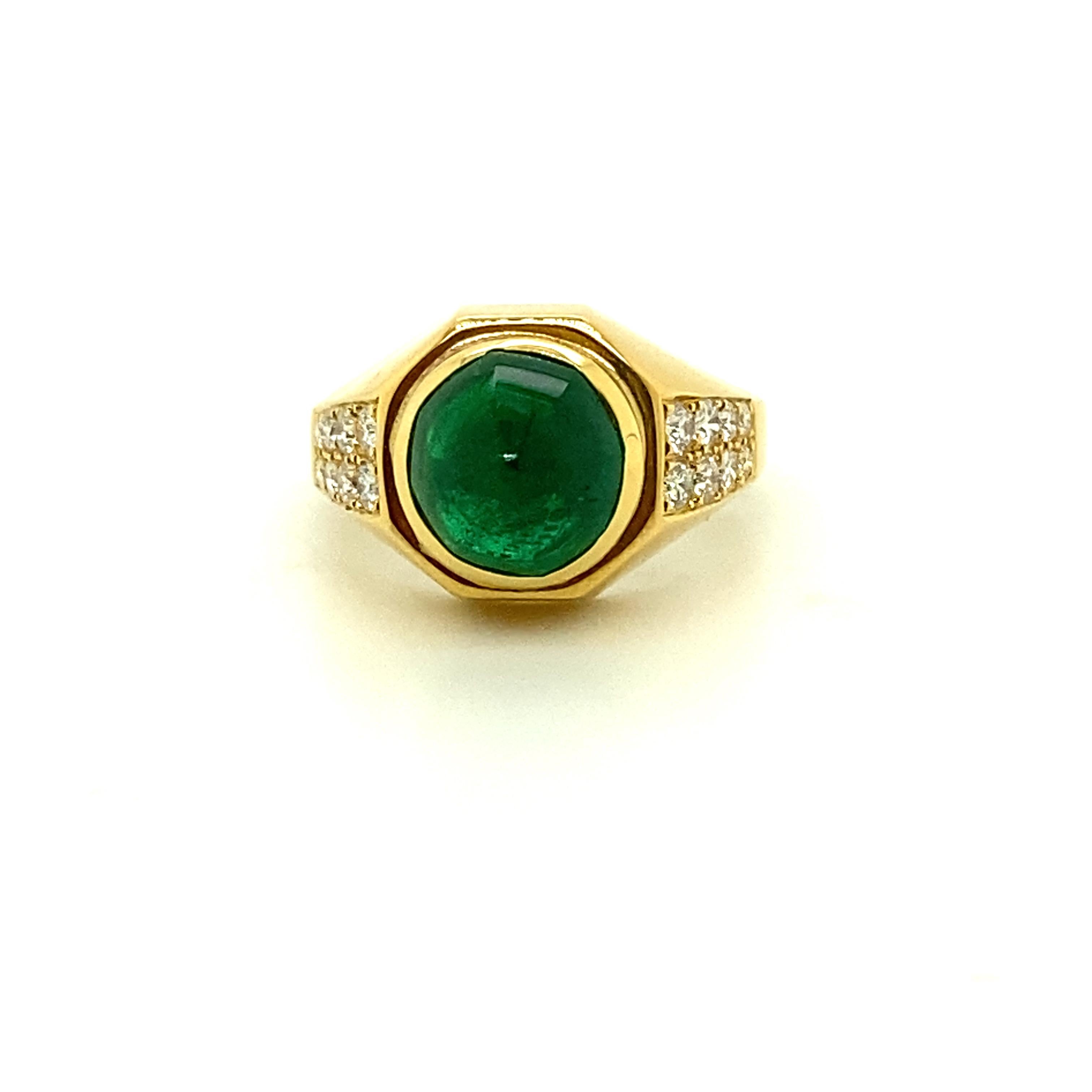 1960s Bulgari GRS Certified Vivid Green Sugarloaf Emerald and White Diamond Ring:

A stunning ring, it features a gorgeous sugarloaf cabochon emerald weighing 3.35 carat, with white round brilliant diamonds on both sides of the ring shank weighing a