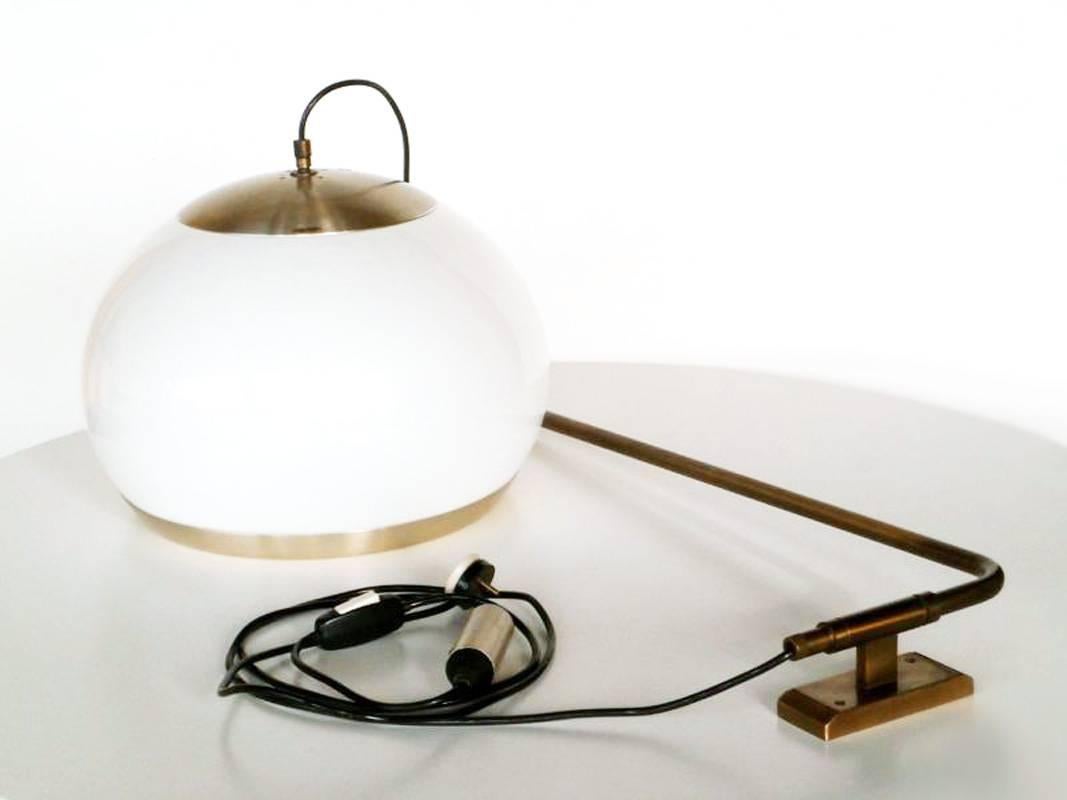 Wall lamp
by Stilux, Milano
1960s

White perspex shade, steel details
Excellent condition.