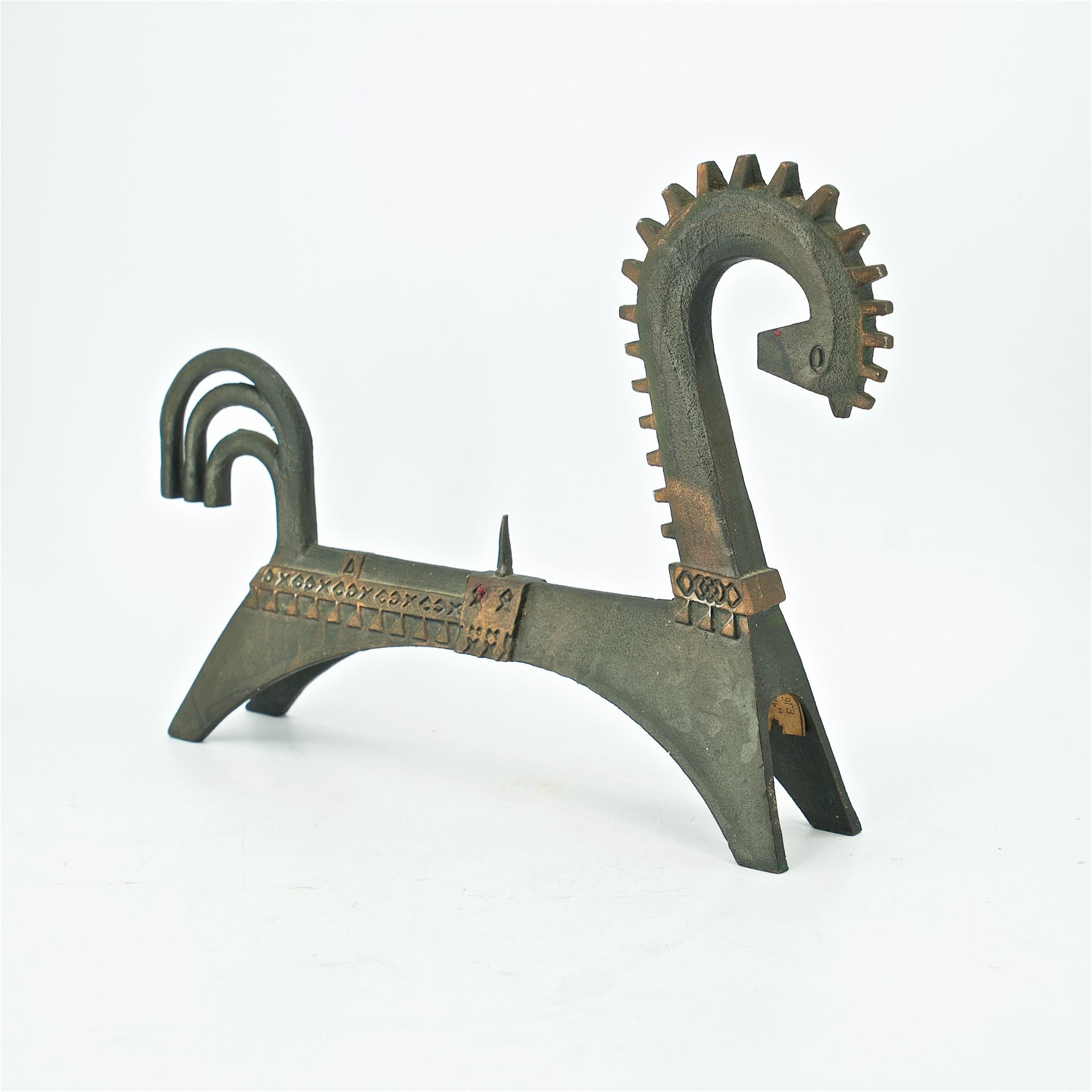 Stylized plated or washed cast metal horse candleholder, weighs 1 lb.