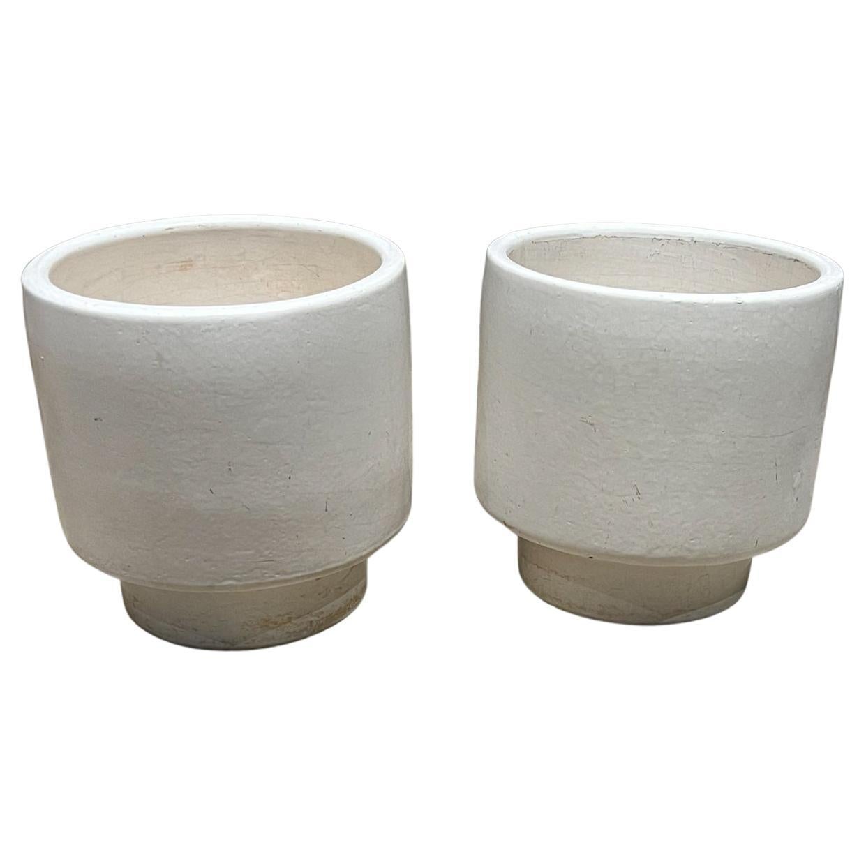 1960s California ceramic Architectural pottery planter pair of white pots Footed attributed to style of Lagardo Tackett 
Signed maker on bottom, hard to read.
Measures: 8.75 tall x 8.25 diameter
Preowned unrestored original vintage