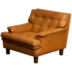 1960s Camel Quilted Buffalo Leather "Merkur" Chair by Arne Norell A.B., Sweden