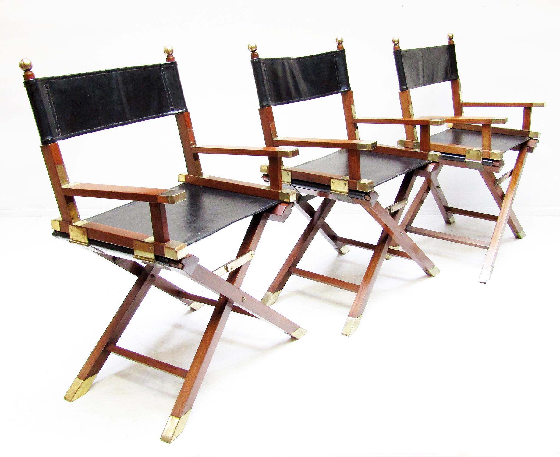A group of three 1960s campaign chairs by renowned Hong Kong-based designer and dealer Charlotte Horstmann.

In mahogany and leather with lavish brass detail, these chairs evoke colonial era luxury.

They are in excellent structural and