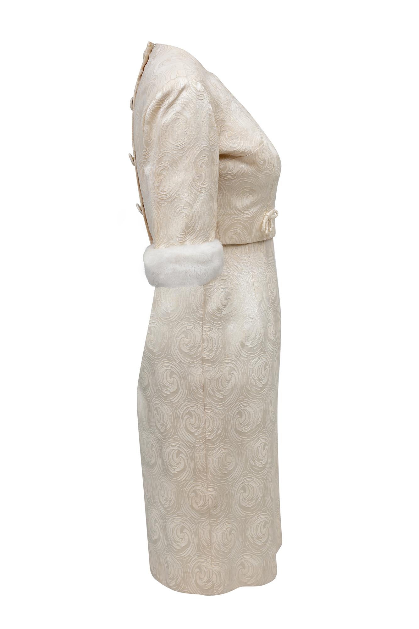 This glamorous early 1960s ivory twin set is a real tribute to Jackie Kennedy's iconic signature look during this era. The brand is Carol Brent, a deeply popular ready to wear brand from America's first ever mail order company Montgomery Ward. The