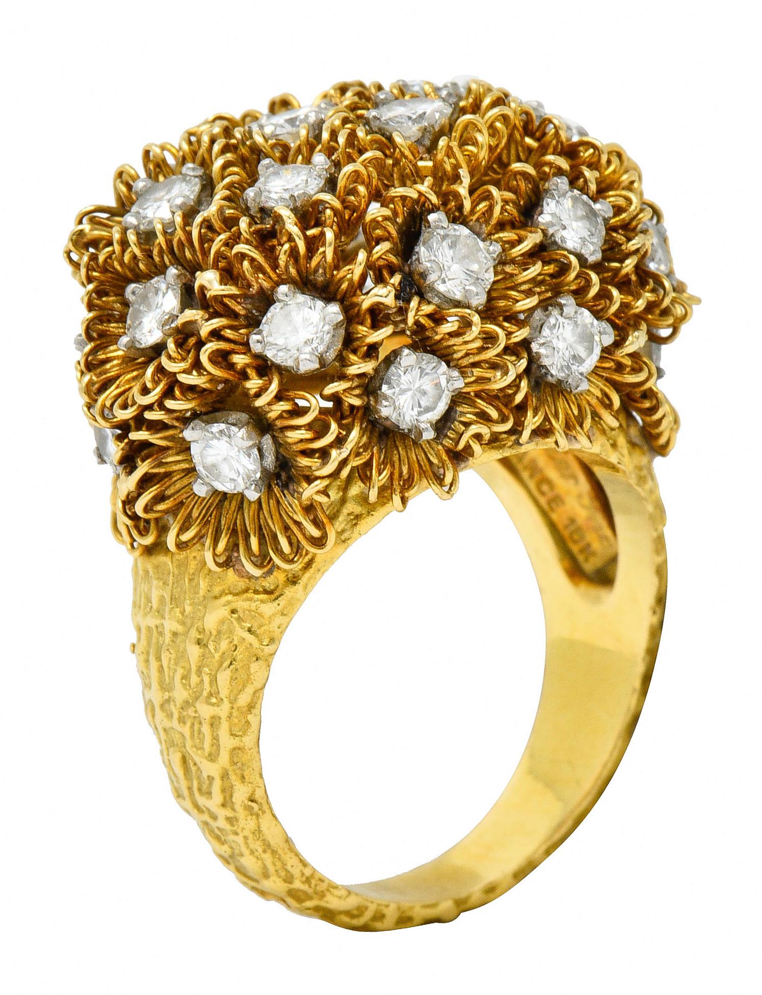 Ring is designed as a bouquet bursting with flourishing flowers

Each highly rendered and handcrafted from gold wire

With round brilliant cut diamonds weighing approximately 2.50 carats; G/H color with VS clarity

Completed by a finely textured