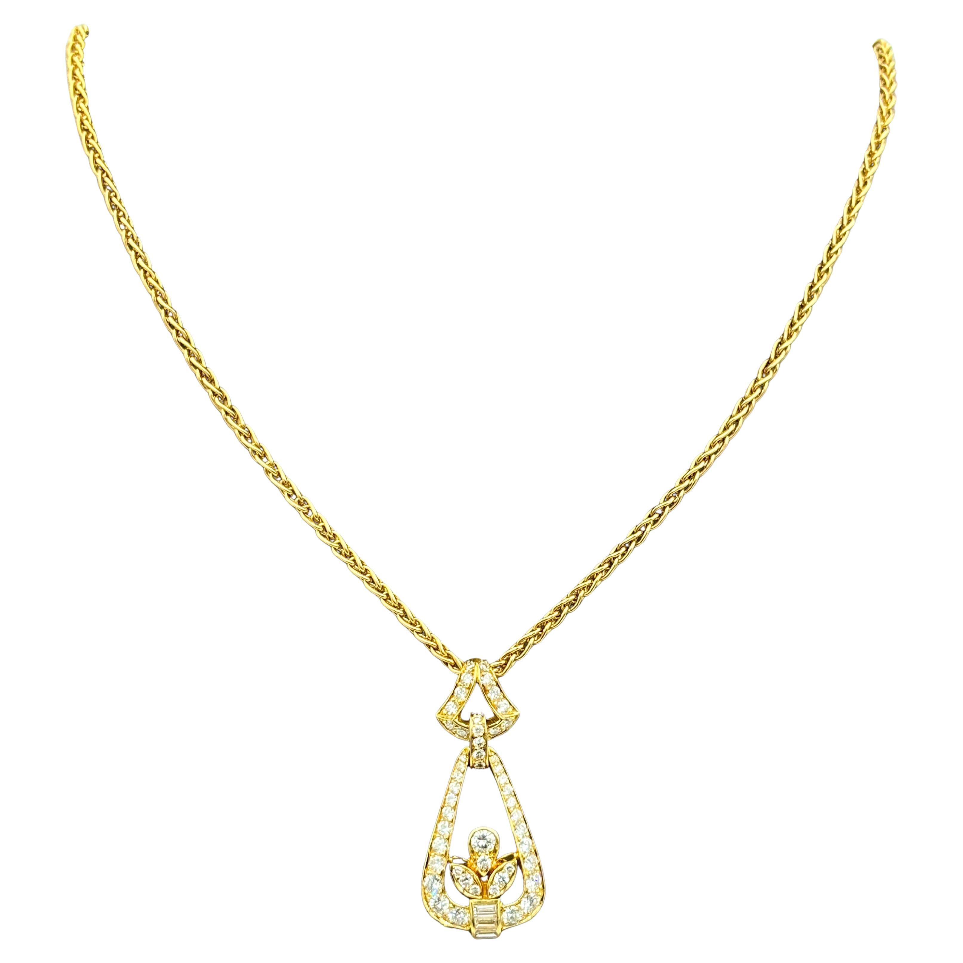 Colgante de oro de 18 quilates y diamantes Cartier París de los años 60 en una cadena Cartier fechada en 1991