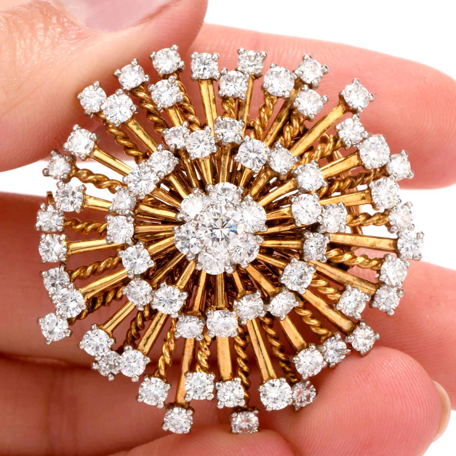 This glistening vintage late 1960's Cartier Pinwheel Brooch forms a pyramid with each of the Diamond tipped and 18k Twisted and Polished

alternating spokes.   Each vibrant Diamond is individually prong set and cumulatively weigh appx. 7.00