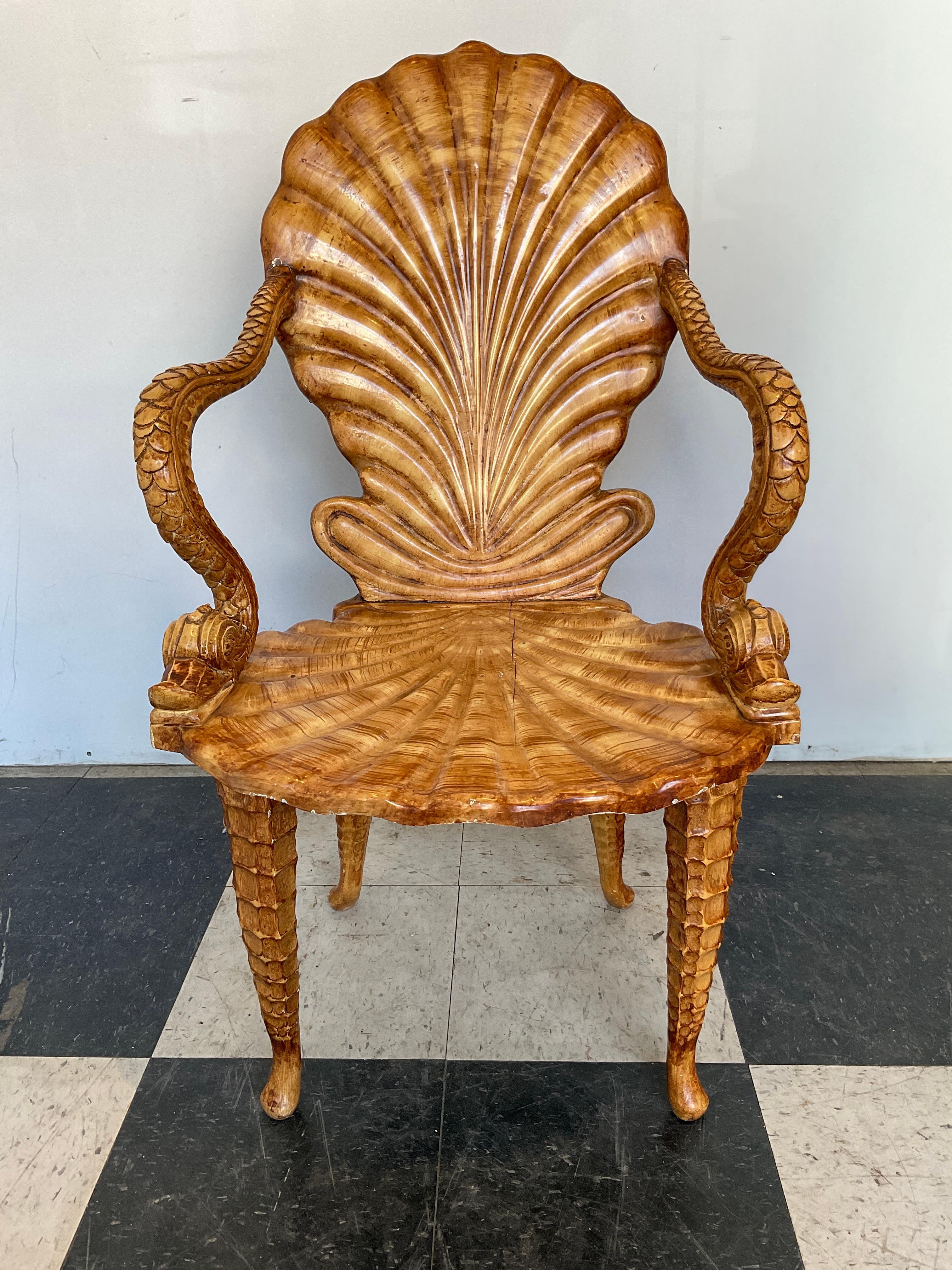 1960s Carved wood Italian fantasy chair, Dolphin arms, she’ll back and seat.