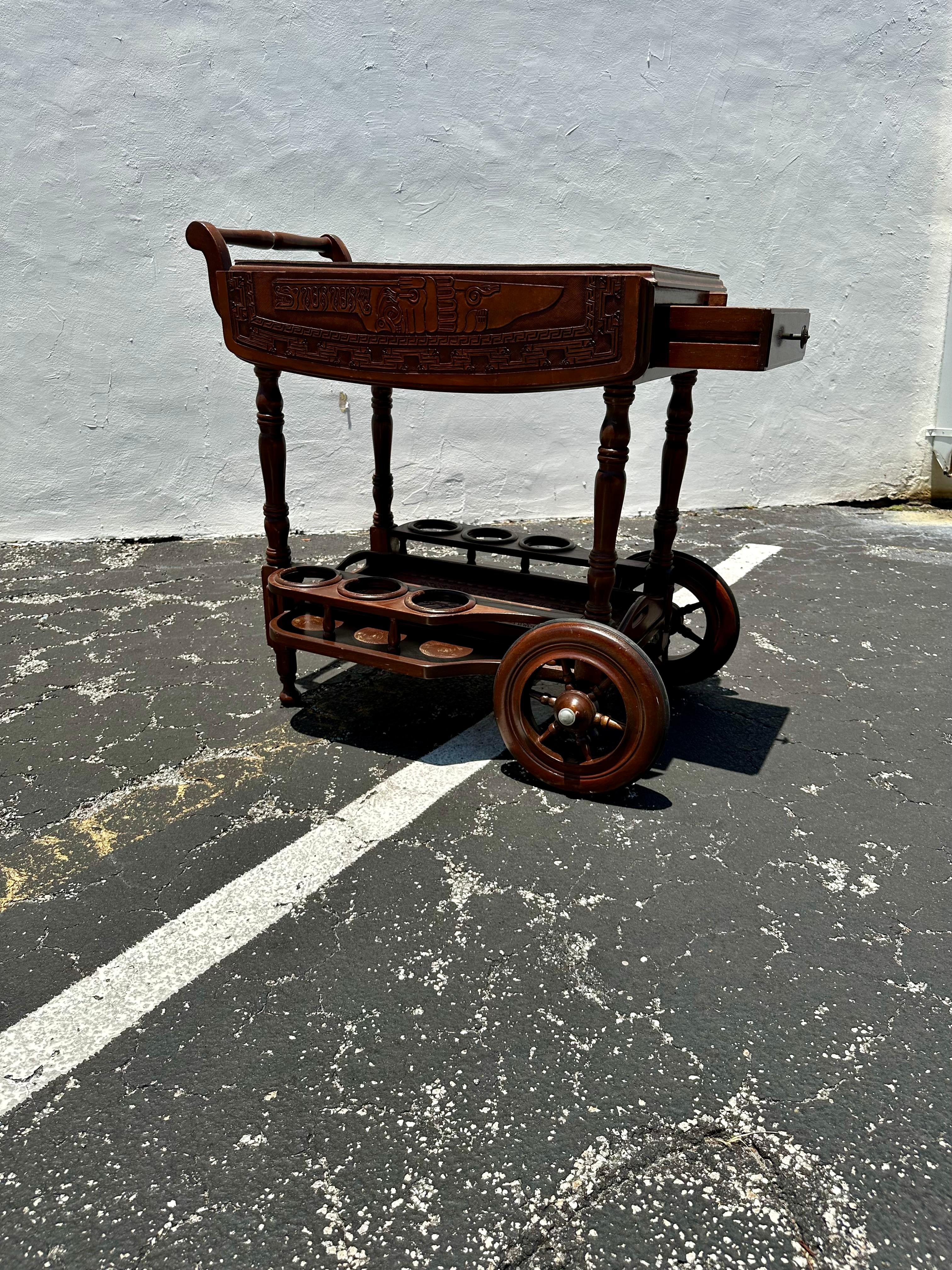 Mid-Century Modern 1960s Carved Wood Leather Embossed Bar Cart Table For Sale