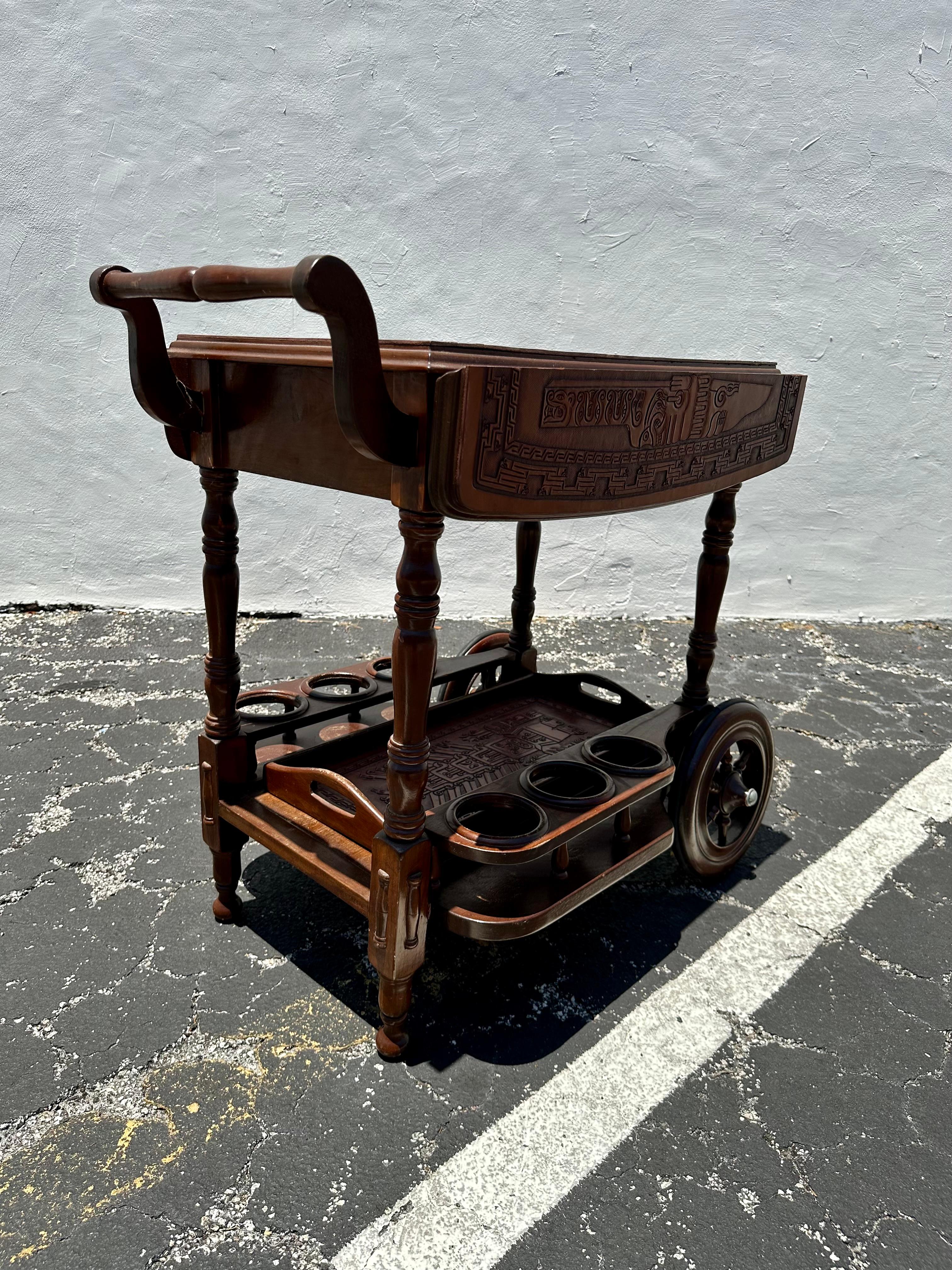 1960s Carved Wood Leather Embossed Bar Cart Table In Good Condition For Sale In Fort Lauderdale, FL
