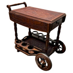 1960s Carved Wood Leather Embossed Bar Cart Table