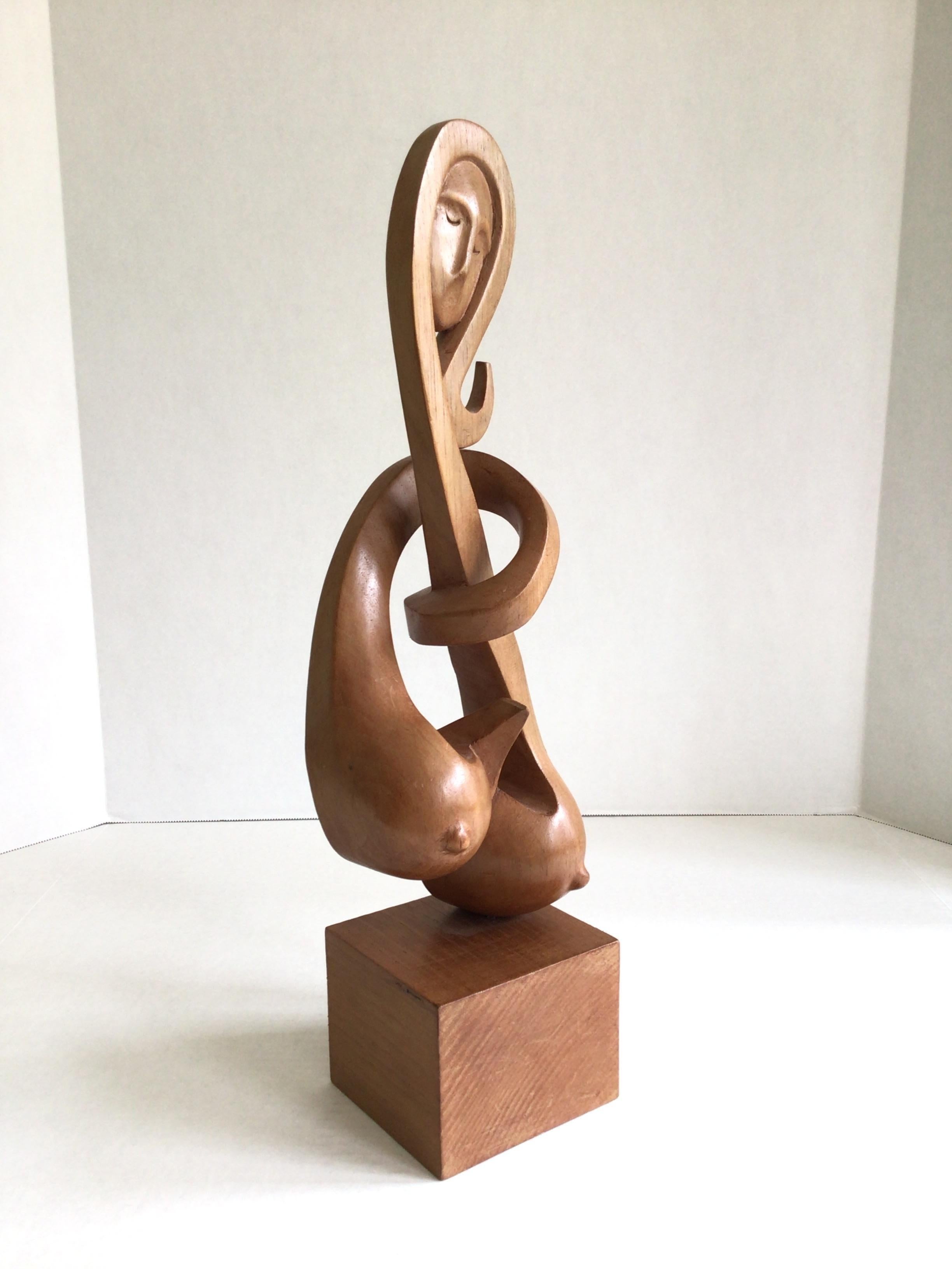 11960s Carved Wood Sculpture of Woman Figure Mounted on Wood Pedestal
Woman with breasts
Mounted on Square Wood Base
Feminism, Motherhood, Beauty 
