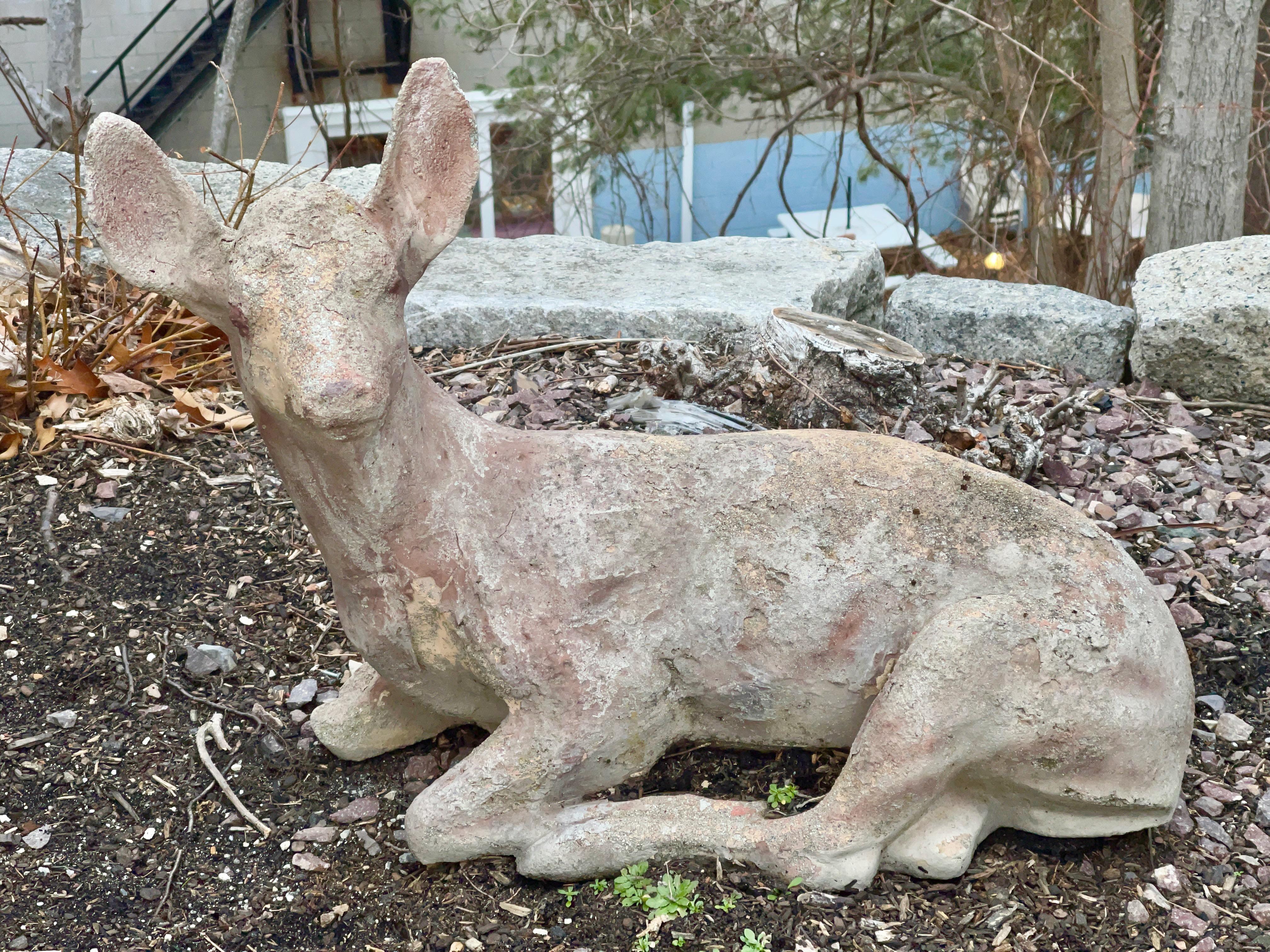 Vintage 1960's cast cement garden statue of a deer (doe?) in repose.
Measures: 21 inches high by 26 inches wide by 12 inches deep. Weight approx. 80 lbs.
Lovely time earned patina.
Available for local pickup or truck delivery.