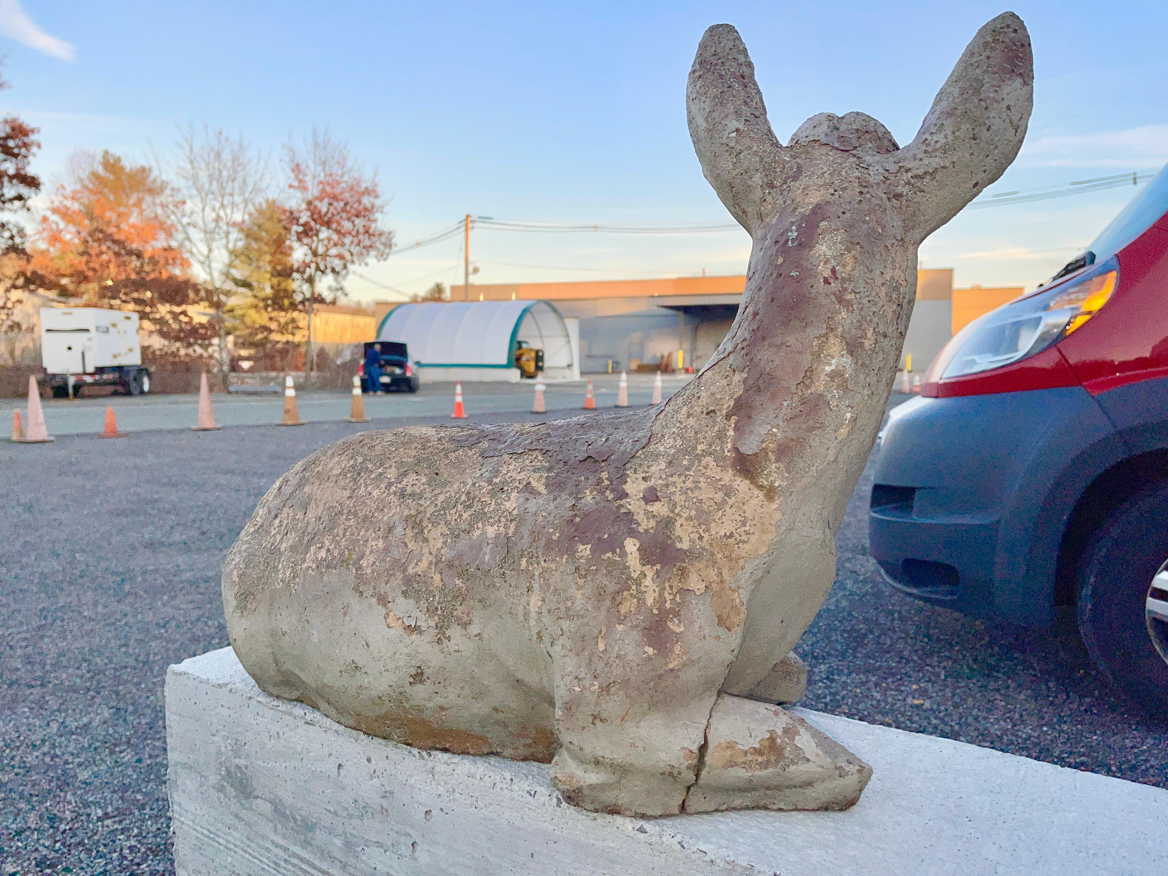 concrete deer statues