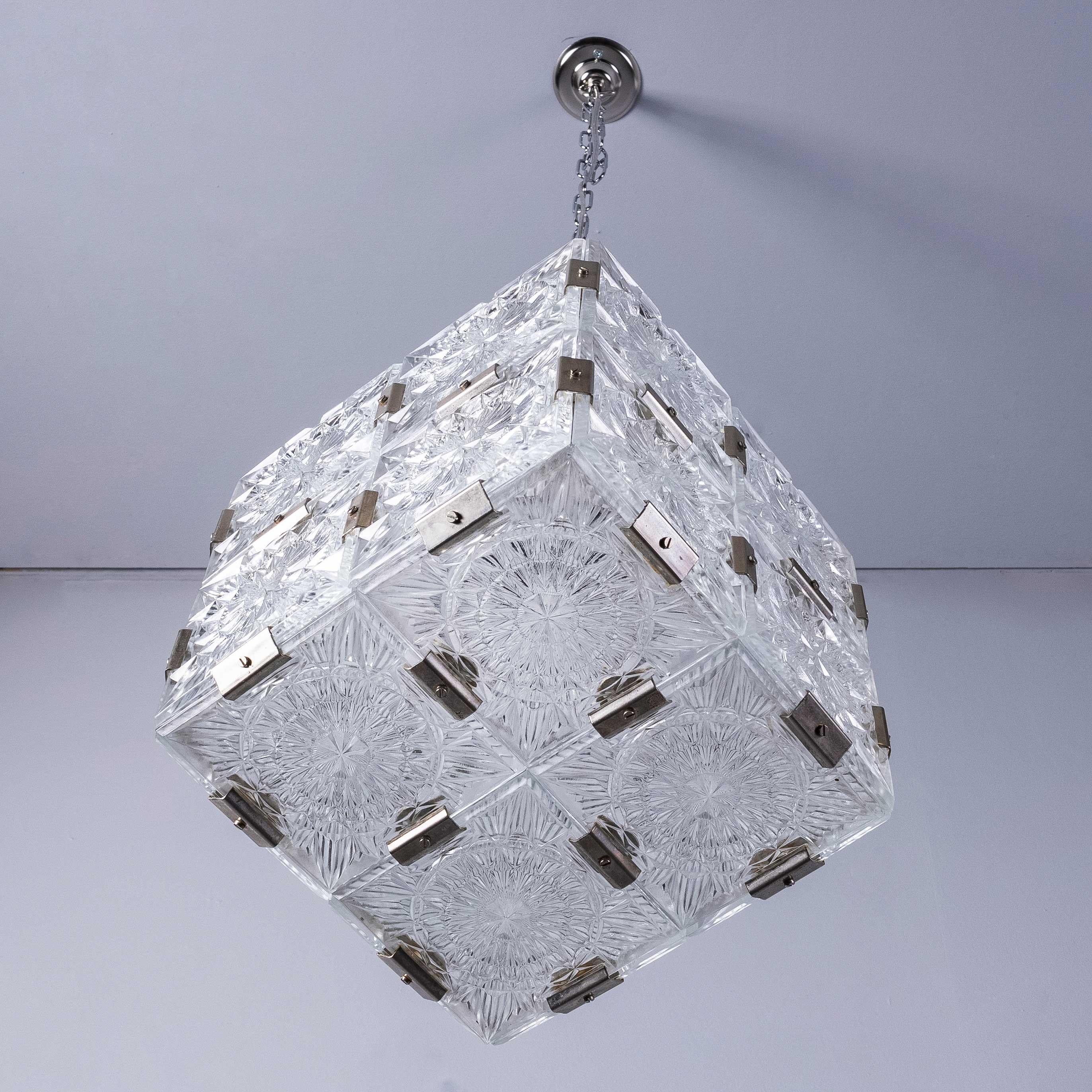 1960’s Cast Glass Cube Pendant Lamps
1950’s Cast Glass Cube Pendant Lamps. Extraordinary cast glass lamps hand cut in the Czech republic using the mottled sixties patterns. The Czech republic has a rich international history of glass production