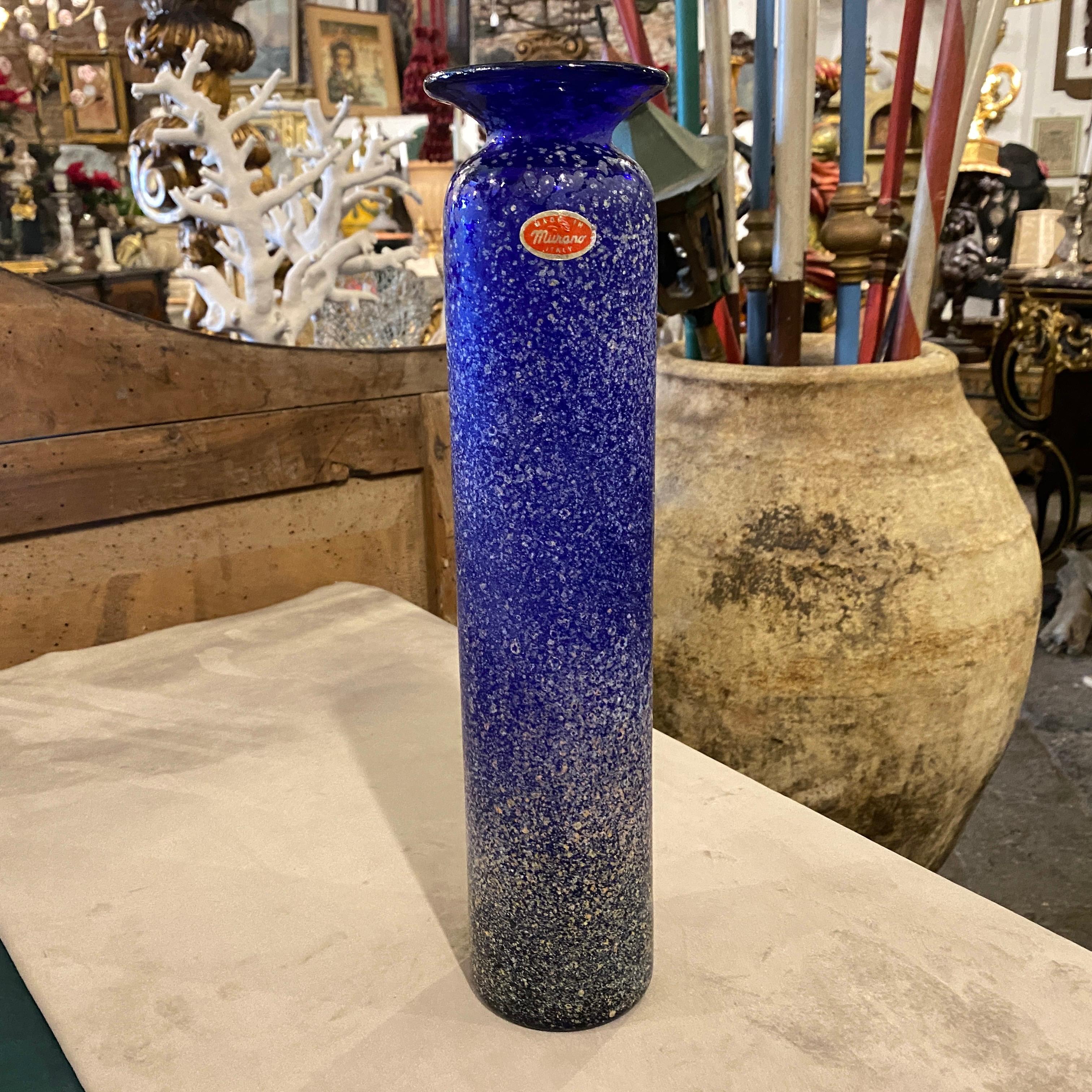 A rare blue scavo murano glass vase made in the Sixties, the particular color of the glass and its modernist shape make it an item attributable to Cenedese.
