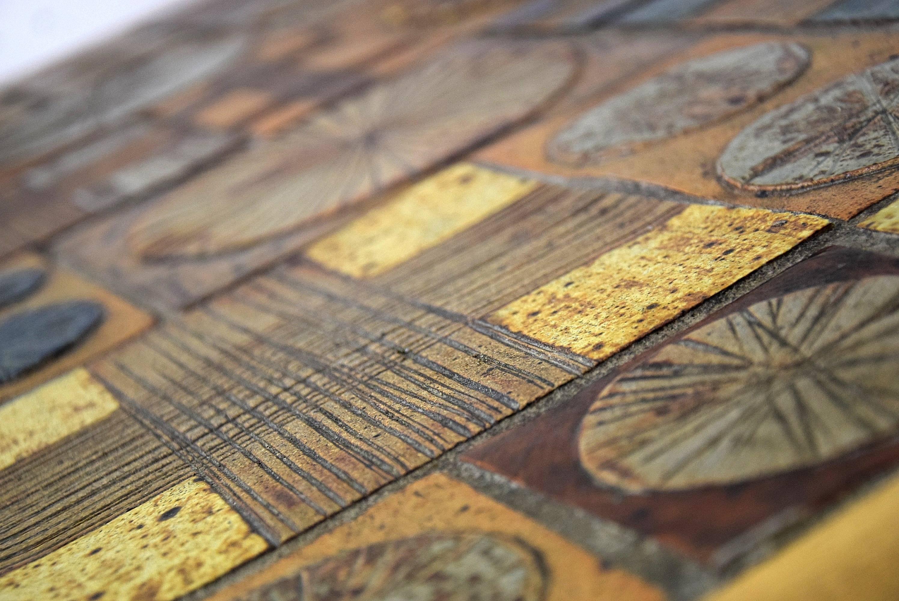 Oak coffee table with ceramic inlays by Tue Poulsen for Haslev Møbelsnedkeri A/S, Denmark in the 1960s.
The coffee table is in great condition and is signed by the artist with TUE as can be seen in image # 7.
Measurements: W 129 x D 68 x H 45