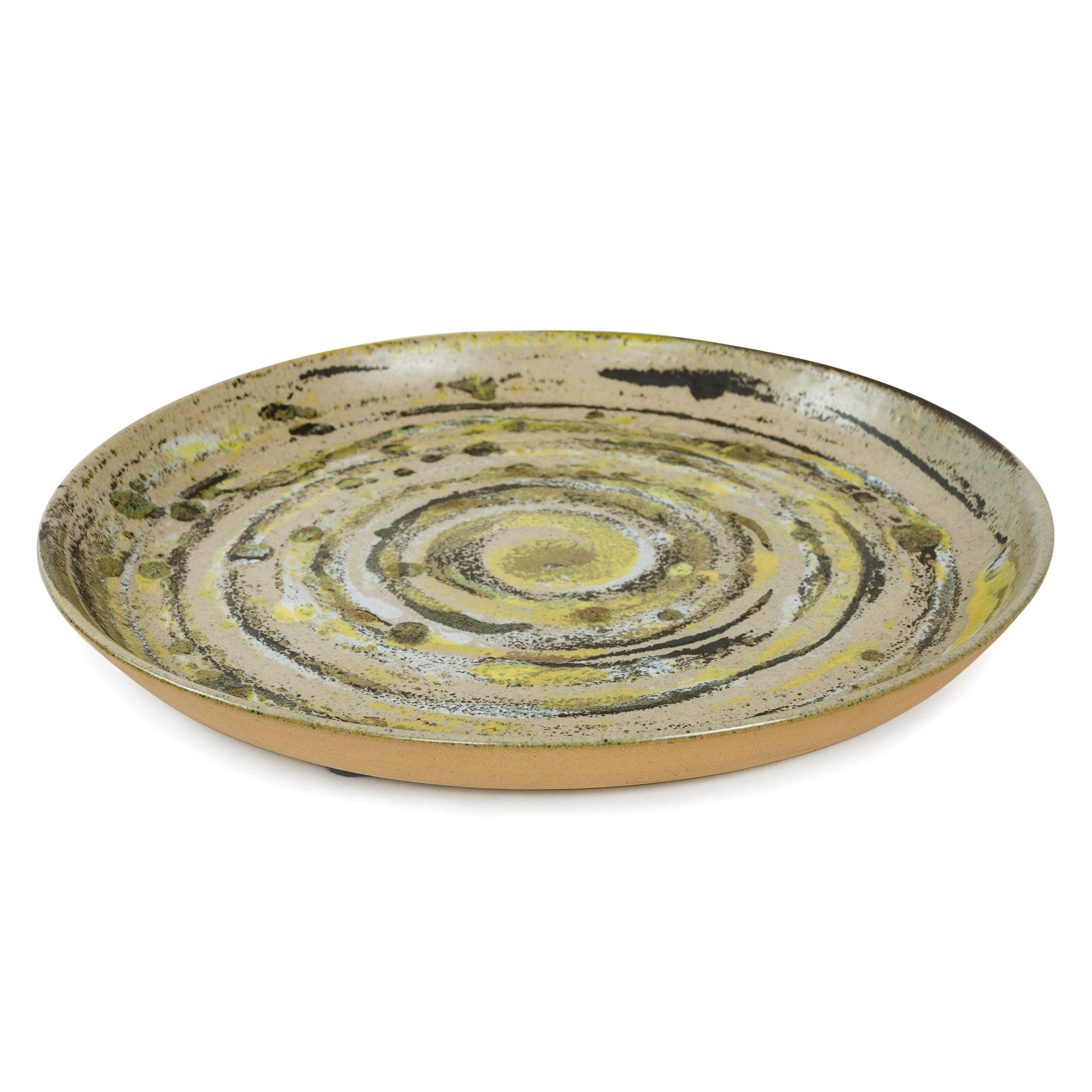 Low walled ceramic bowl in green (29D27) ‘brushed glaze’ circular pattern.