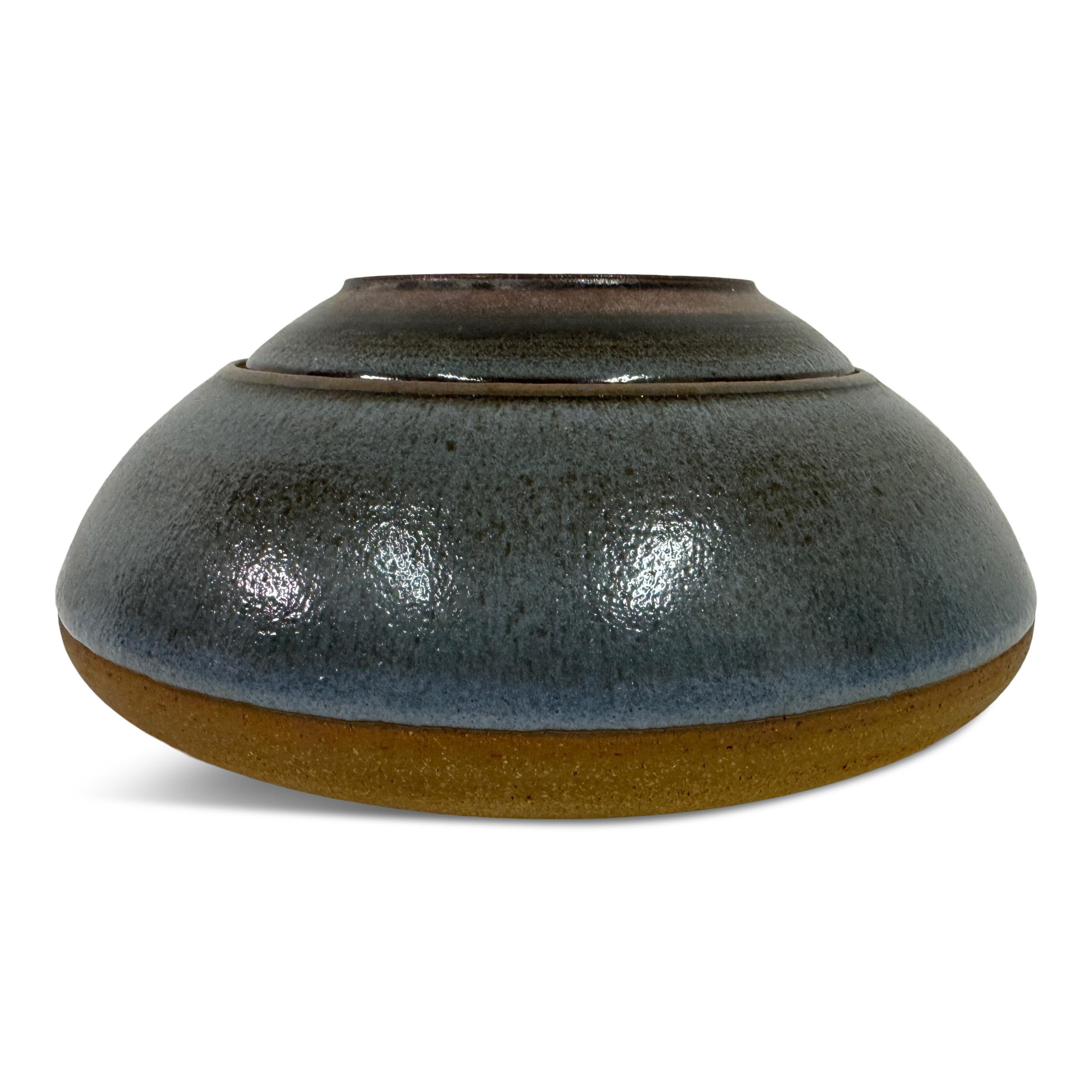 Lidded pot

By Nanni Valentini

For Ceramica Arcore

Ceramic

Removeable lid which can double up as a small dish

Signed underneath

Italy 1960s